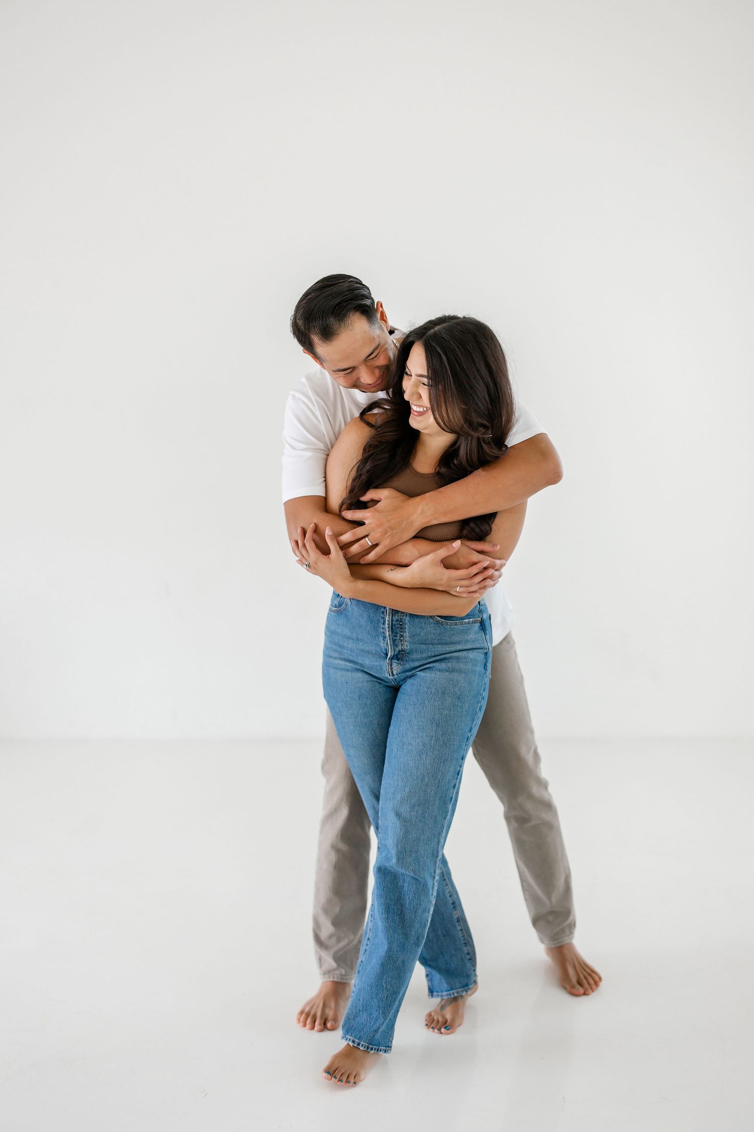Couple embracing in a studio location