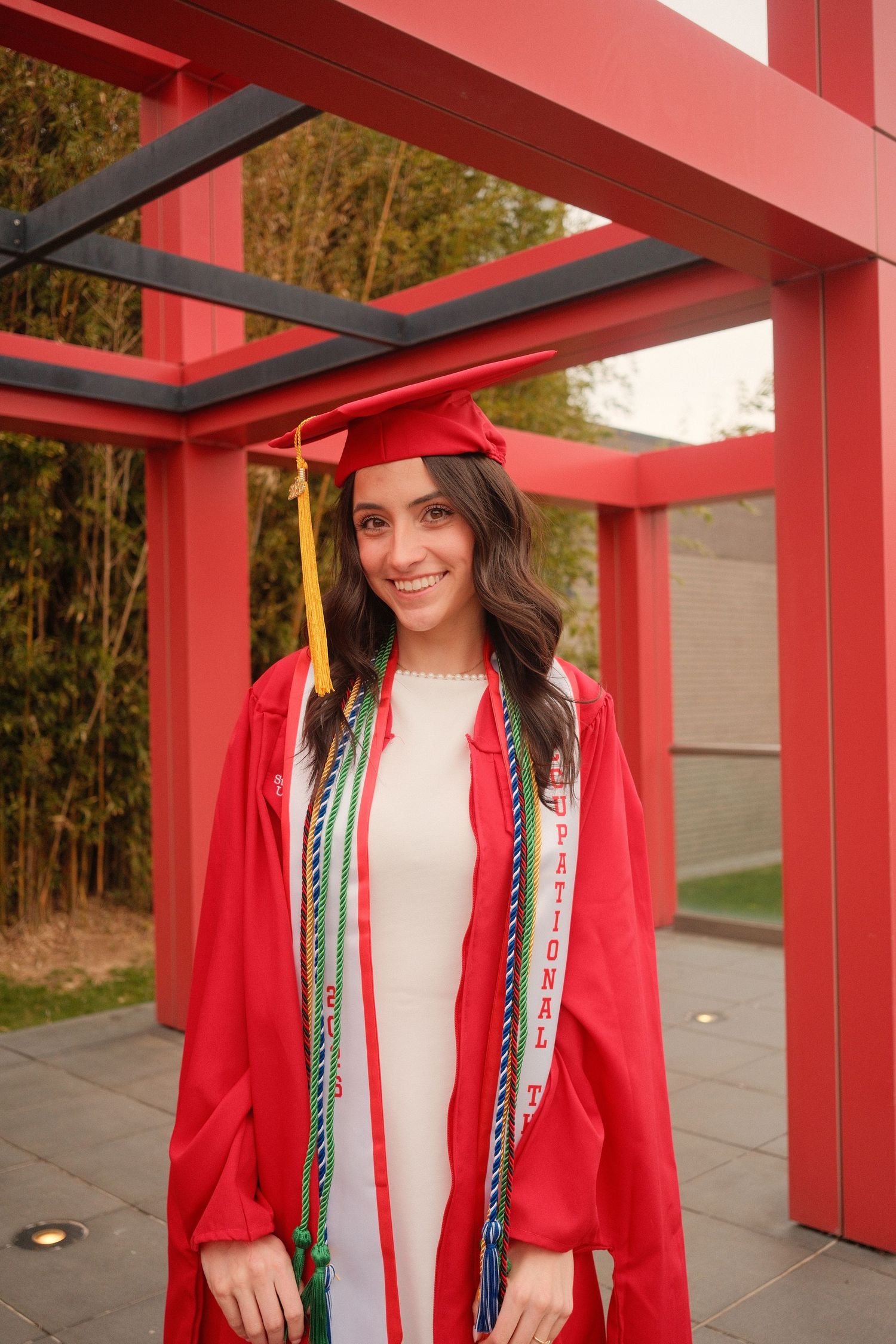 Classic graduation headshot with a natural and relaxed approach.