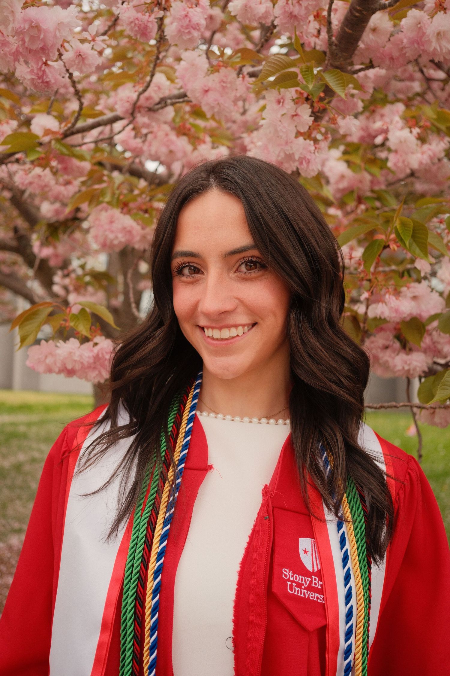 Classic graduation headshot with a natural and relaxed approach.