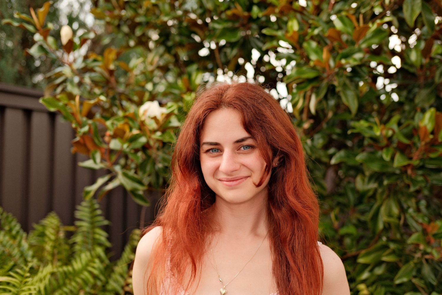 Headshot of photographer Marissa with a film-inspired and natural light aesthetic.