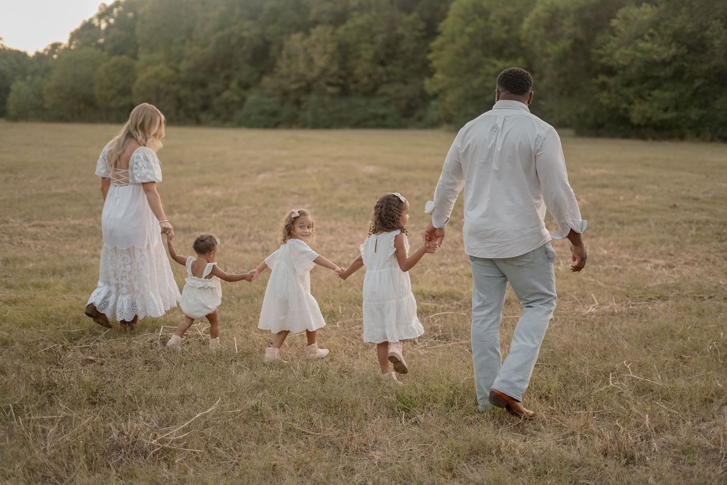 “Middle Tennessee luxury family maternity portrait with parents, children, and expecting mom in natural, elegant setting”