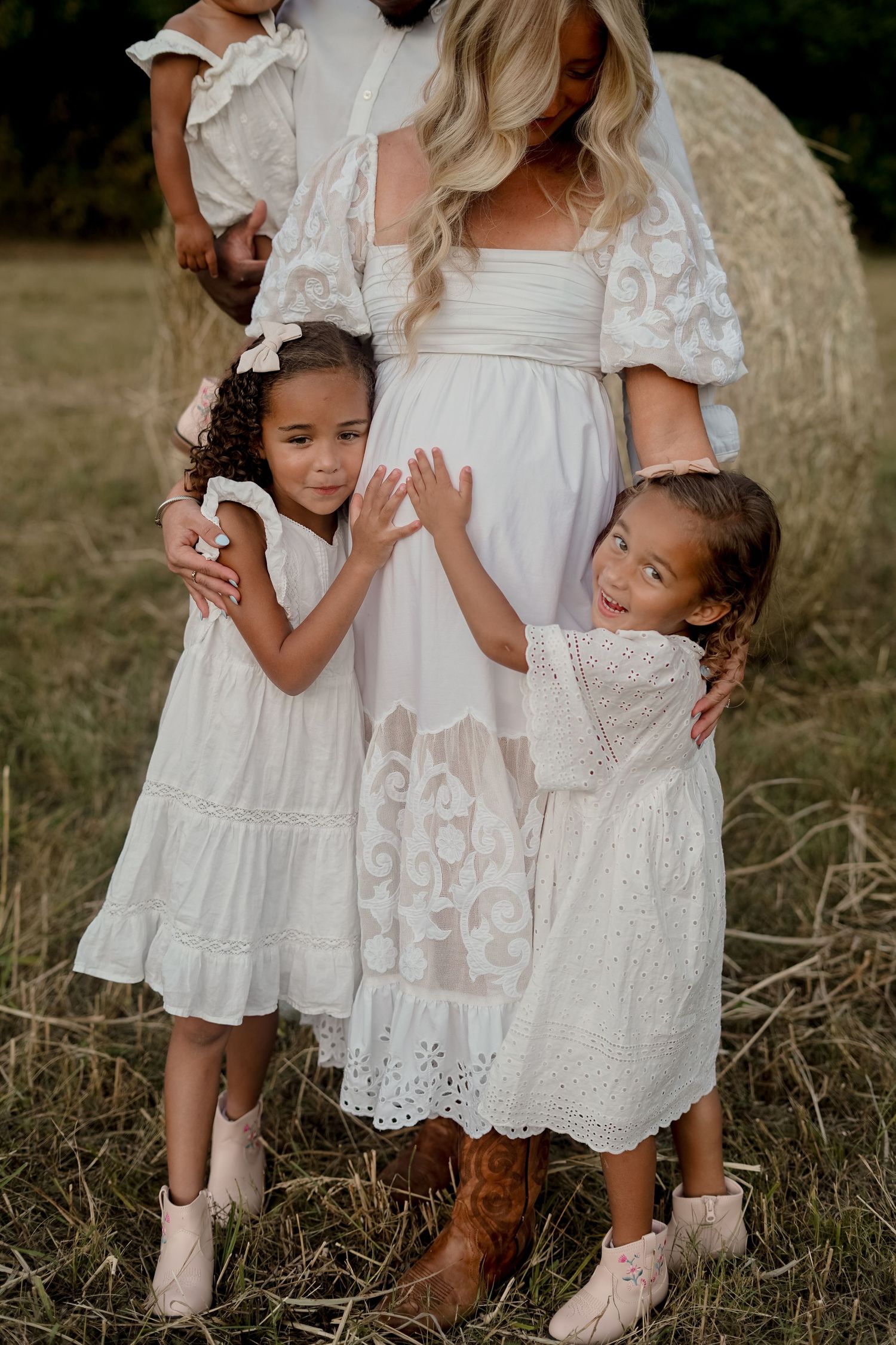 “Middle Tennessee luxury family maternity portrait with parents, children, and expecting mom in natural, elegant setting”