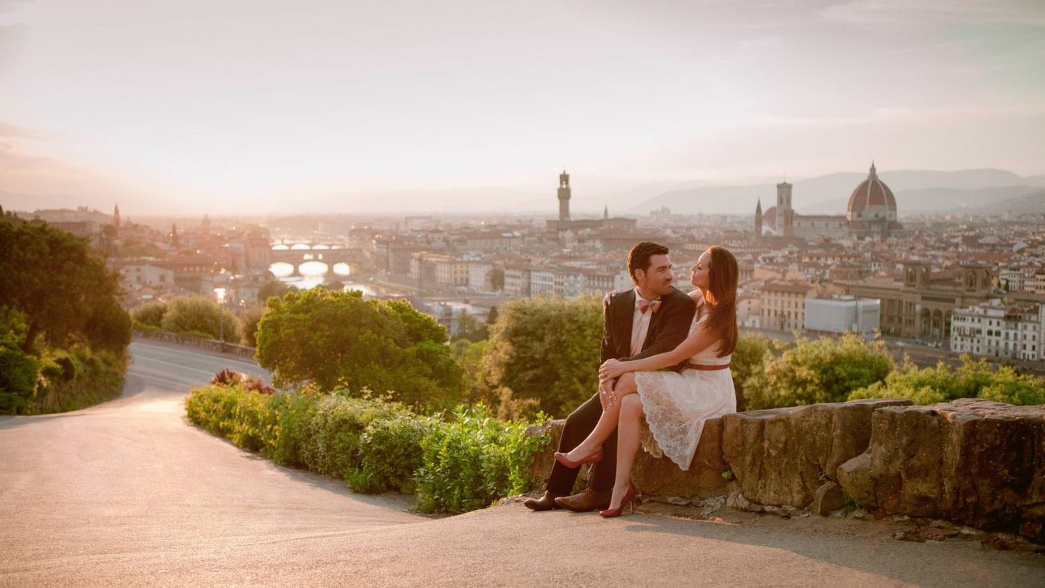 Golden sunset view over Florence's historic skyline from Piazzale Michelangelo.
