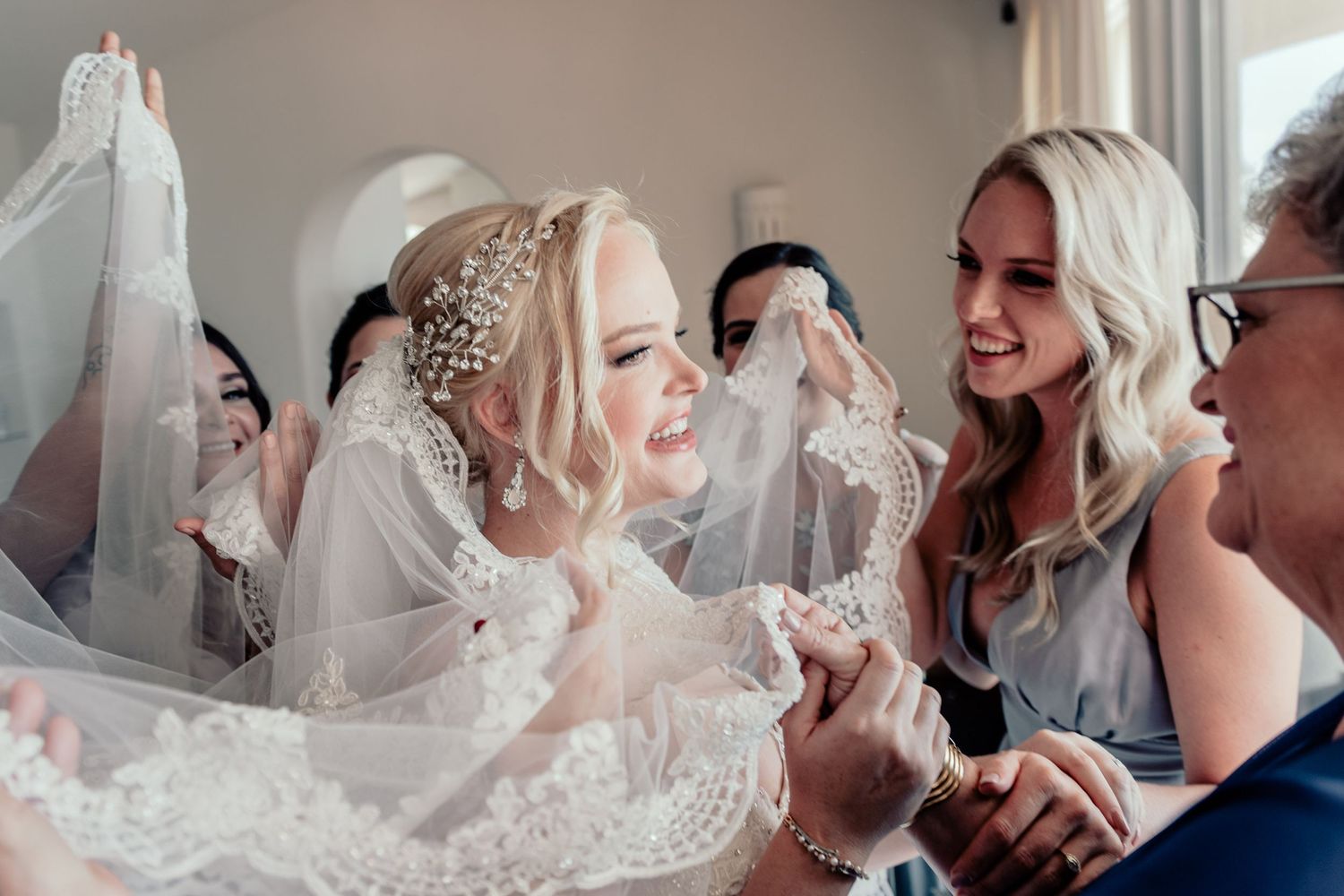 Series of candid black and white photos capturing joyful pre-wedding moments.