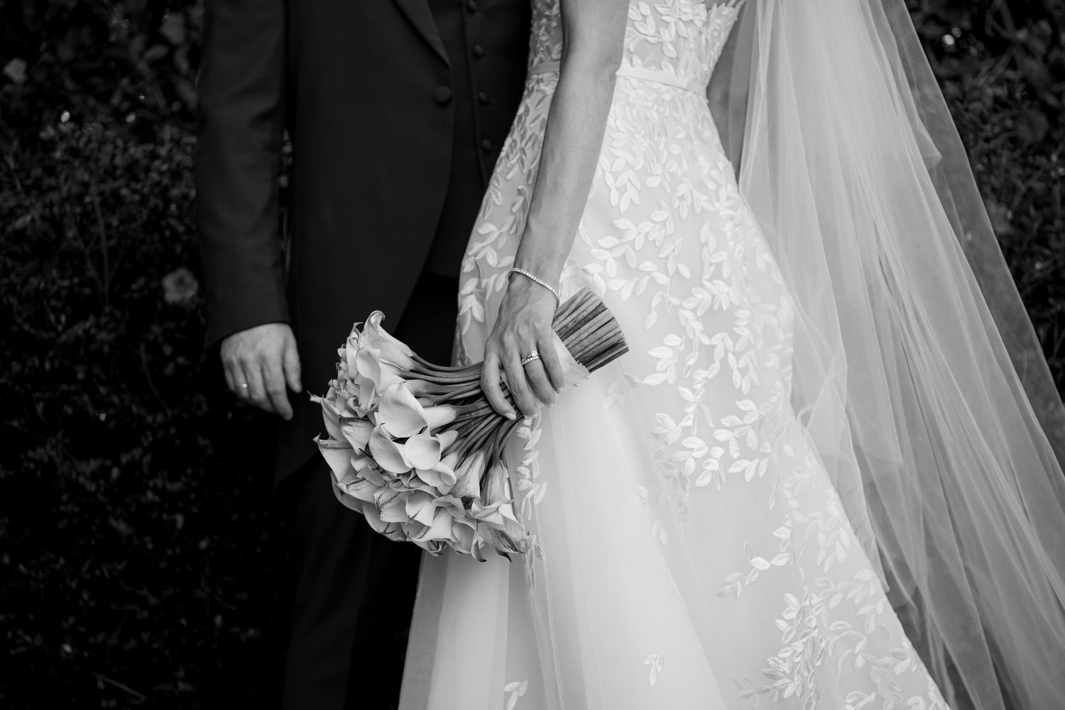 Detailed shots of wedding dress lace and flowing veil in natural light.