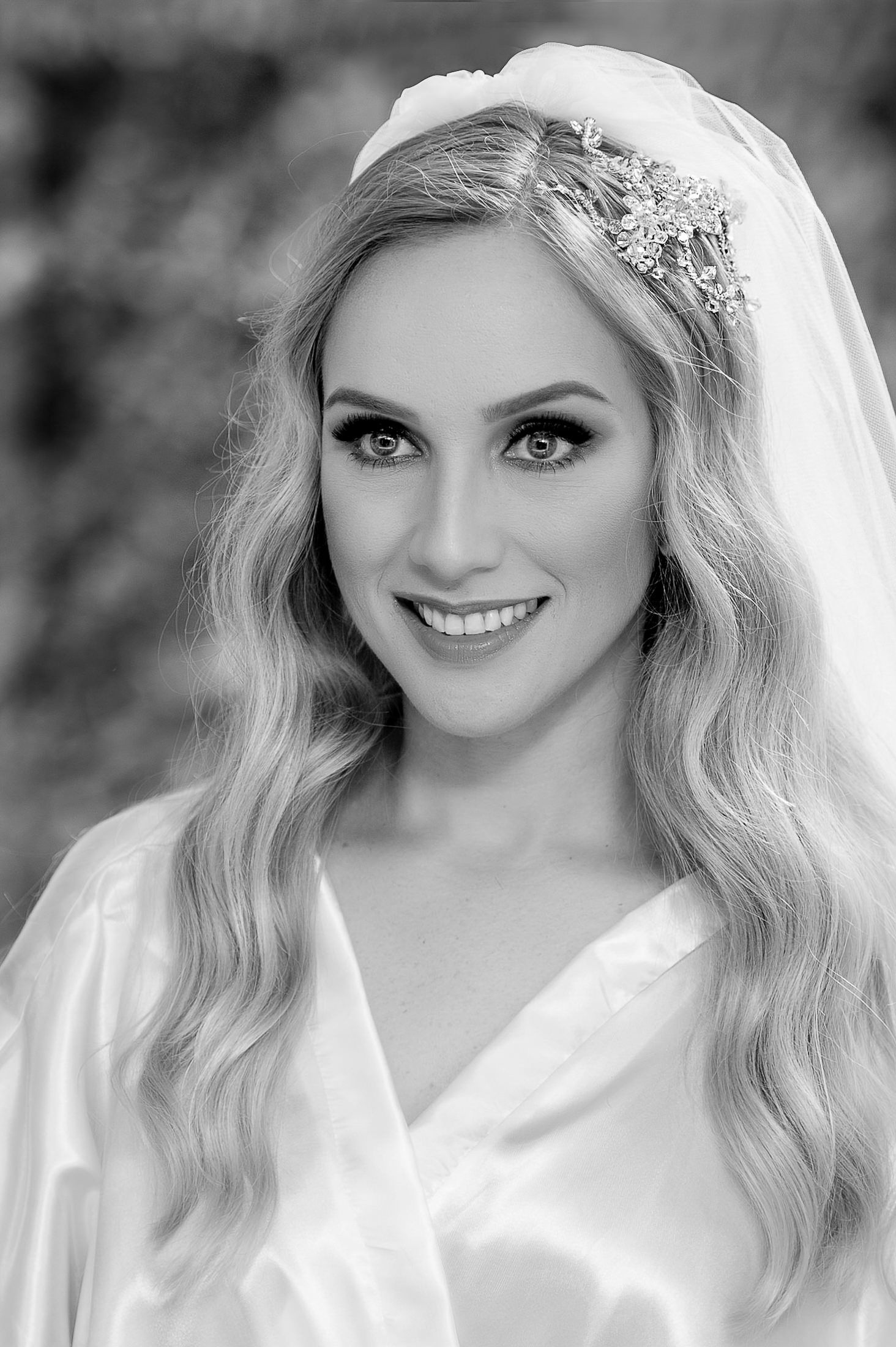 Black and white bridal portraits with veil and tiara.
