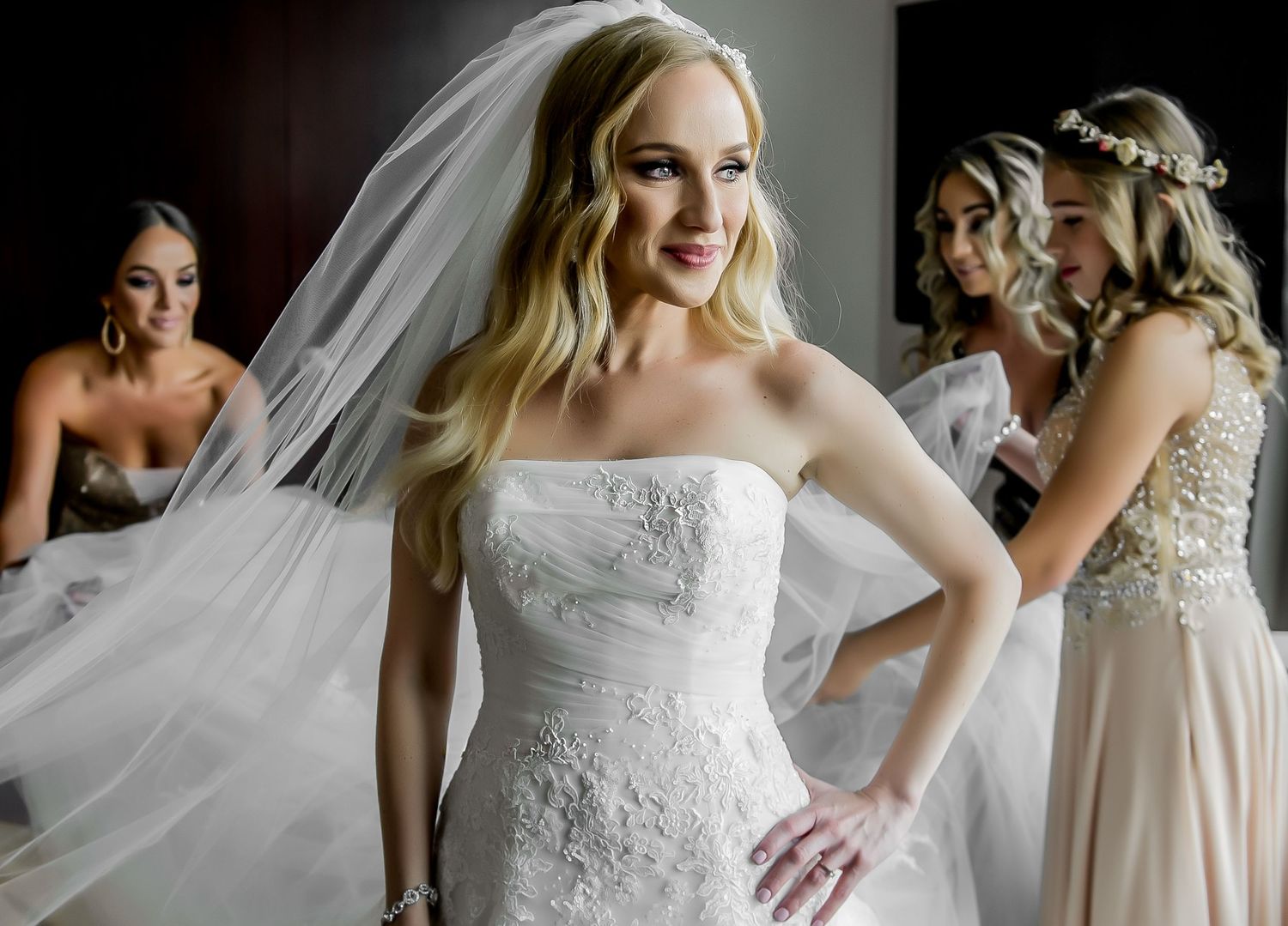 Elegant white wedding dress details with delicate lace and tulle fabric shown in multiple angles.