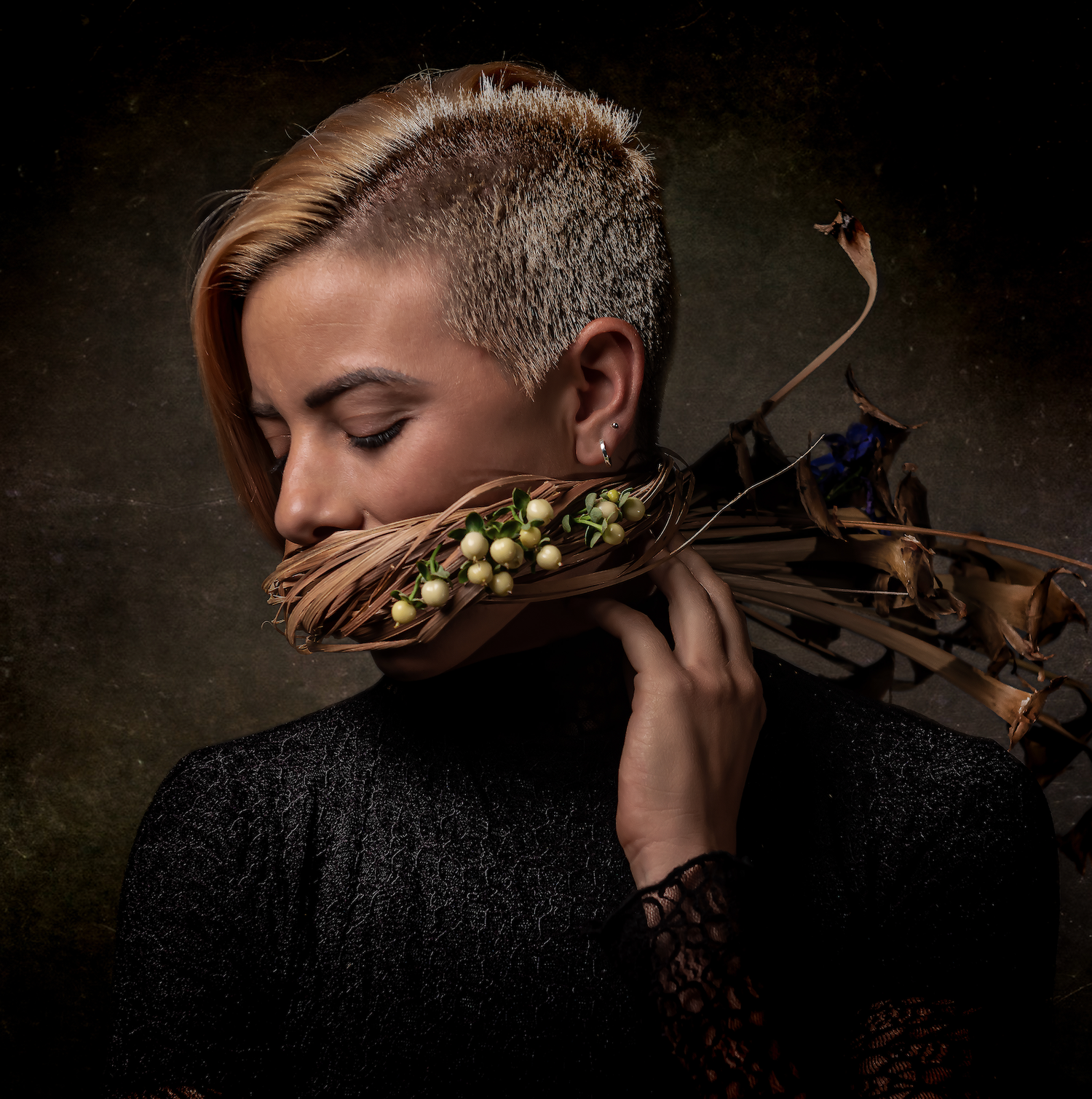 An artistic portrait featuring dried flowers and moody lighting in Renaissance painting style.