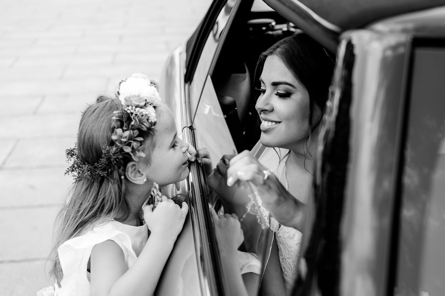 Black and white portrait showing wedding preparation moments.