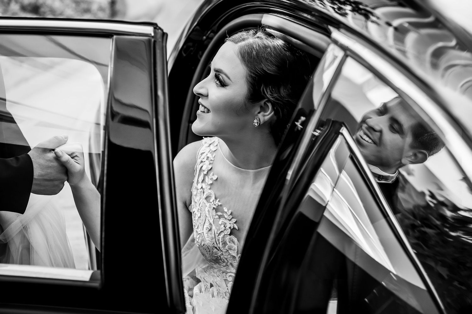 Black and white wedding photos showing moments before the ceremony.