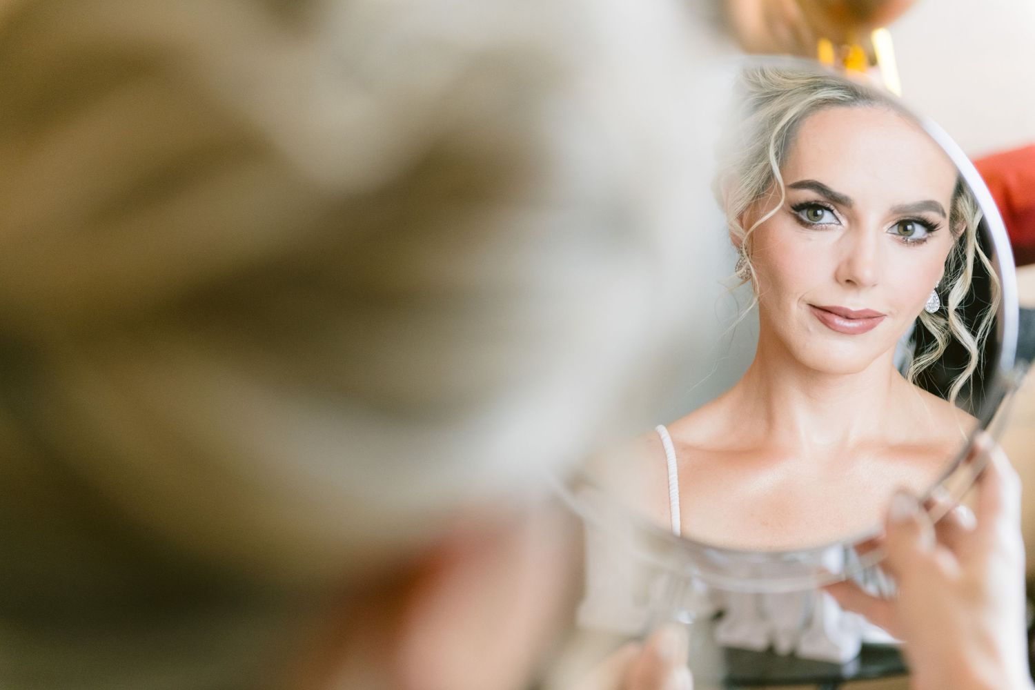 Soft focus wedding day portrait shots in warm tones.