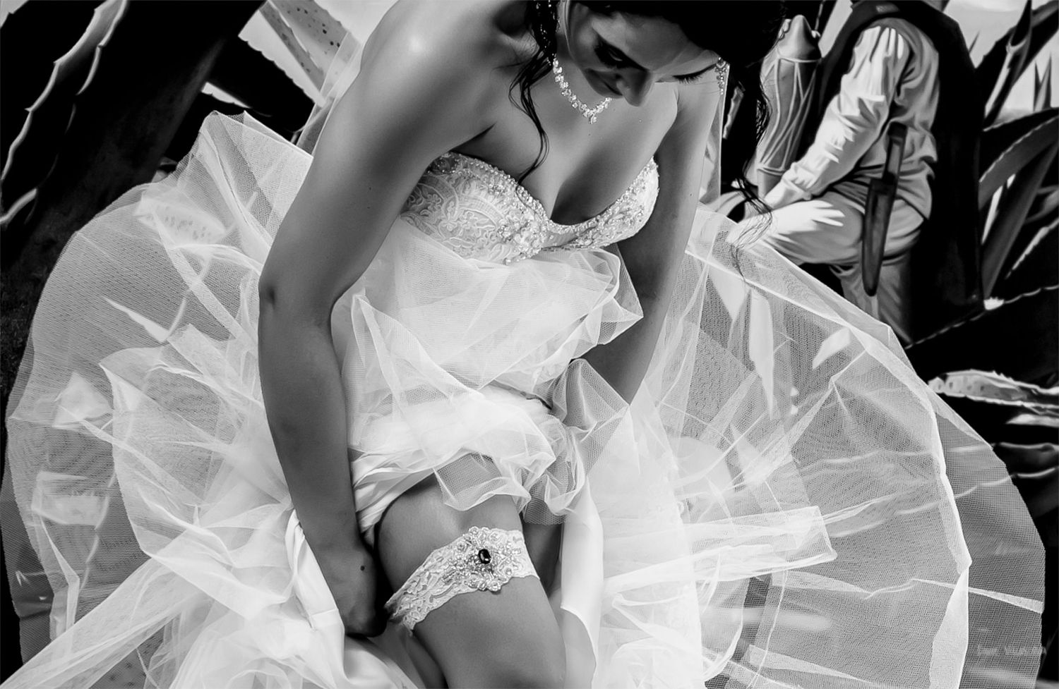 Abstract black and white artistic shots of flowing white fabric and movement.