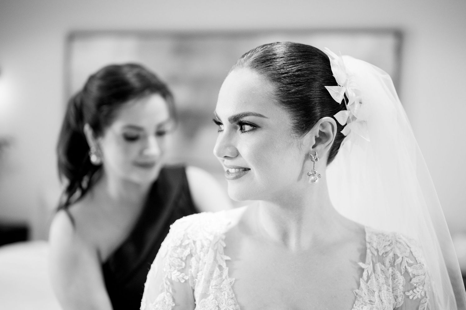 Elegant black and white portrait shots showing bridal details and lace.