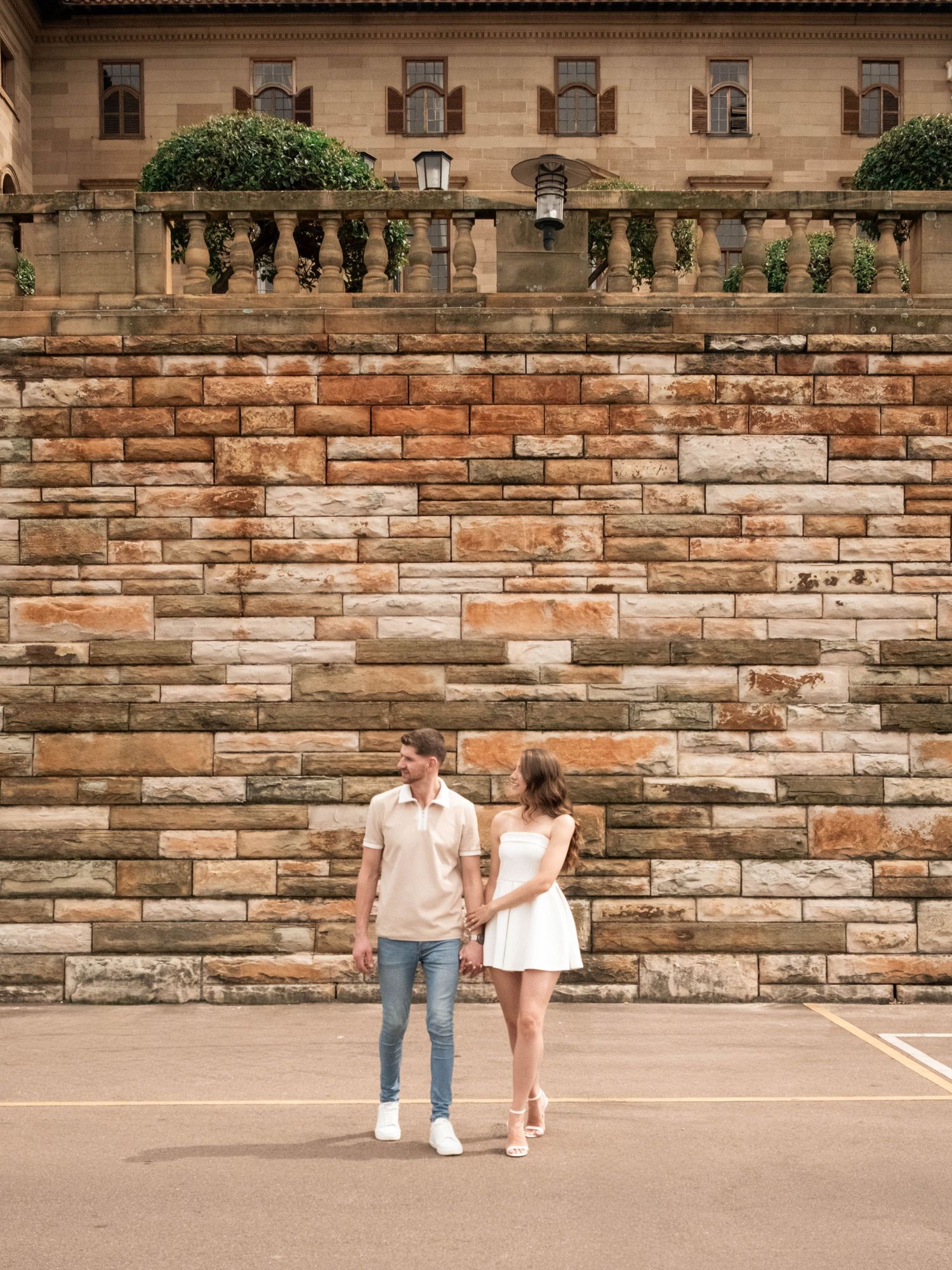 Couple holding hands during an outdoor couples photography session in South Africa.