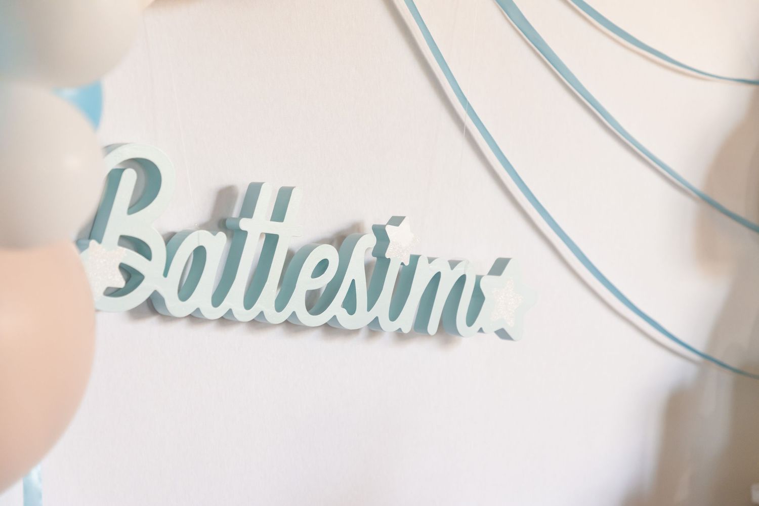 Light blue Battesimo sign decoration for Italian baptism celebration party.