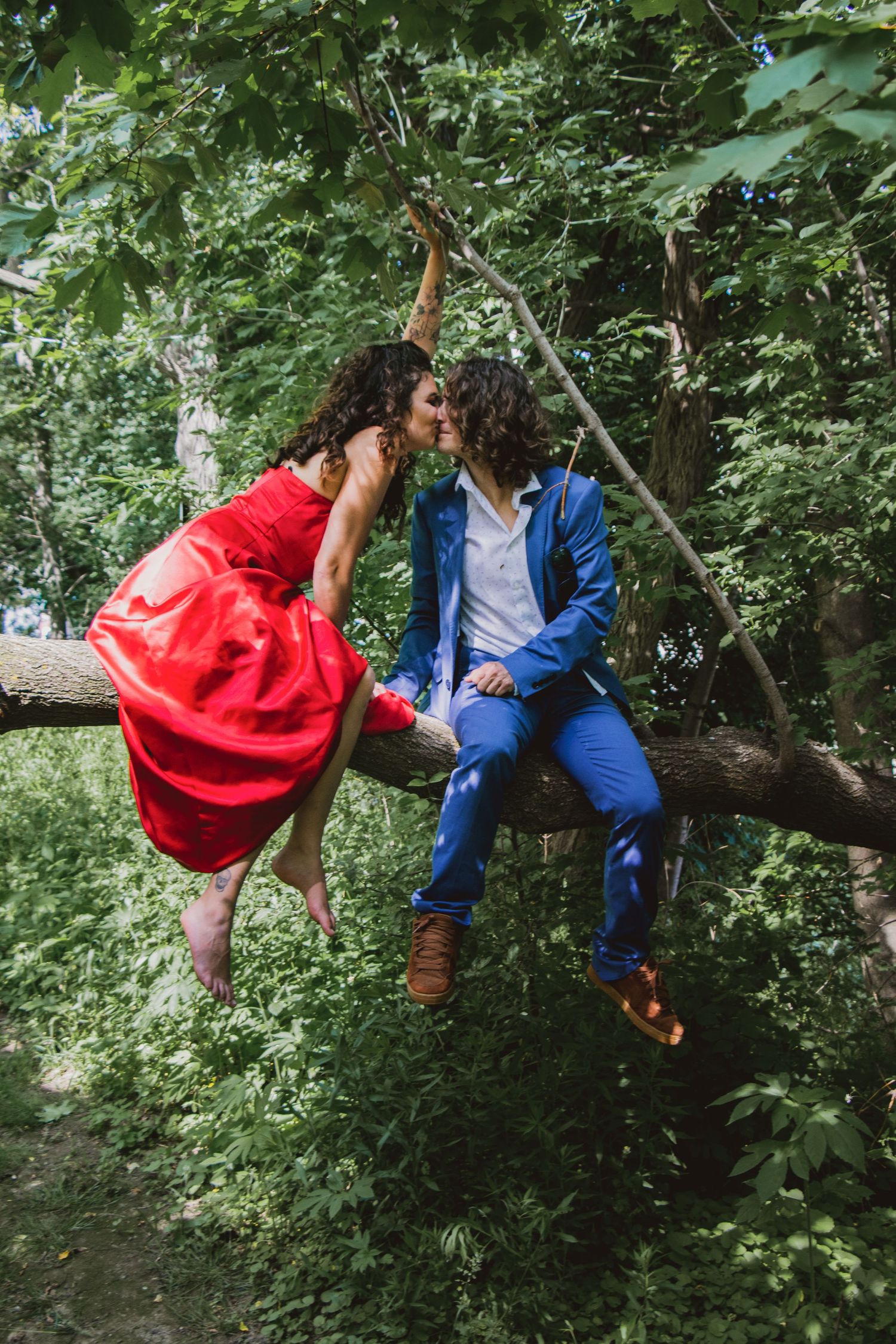 nature filled engagement picture with bright colours in the Kitchener-Waterloo region