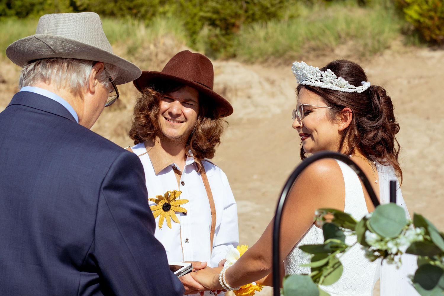 bride and groom smiling at their wedding ceremony at kitchener–Waterloo Cambridge Region