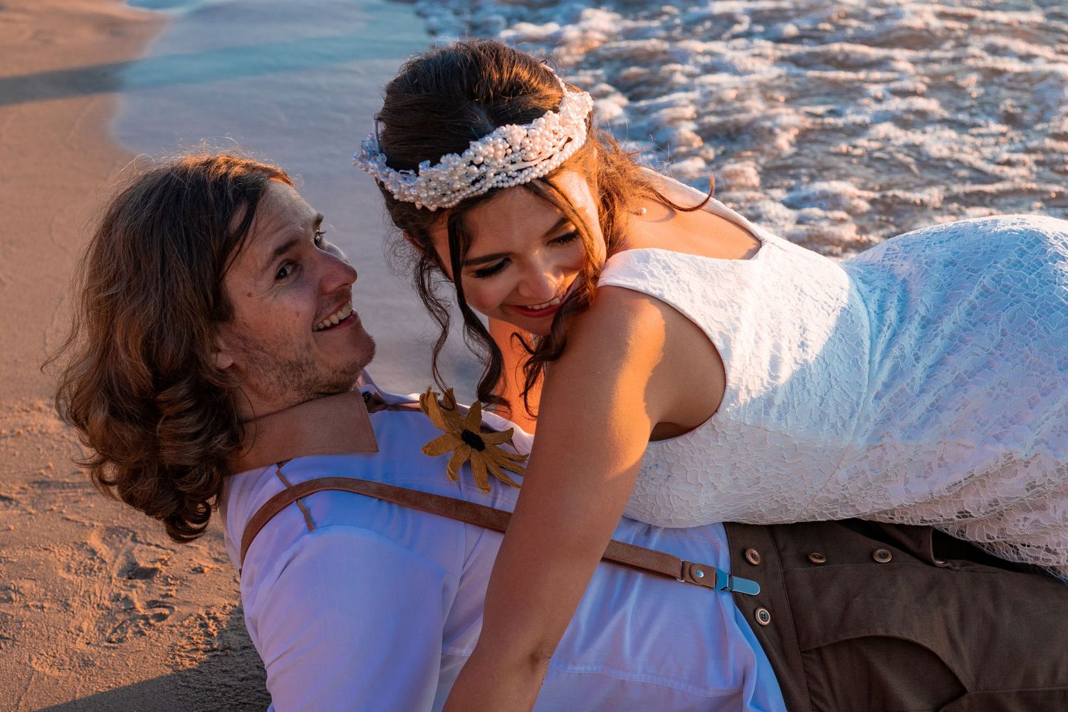 newly weds having fun at the beach at kitchener–Waterloo Cambridge Region
