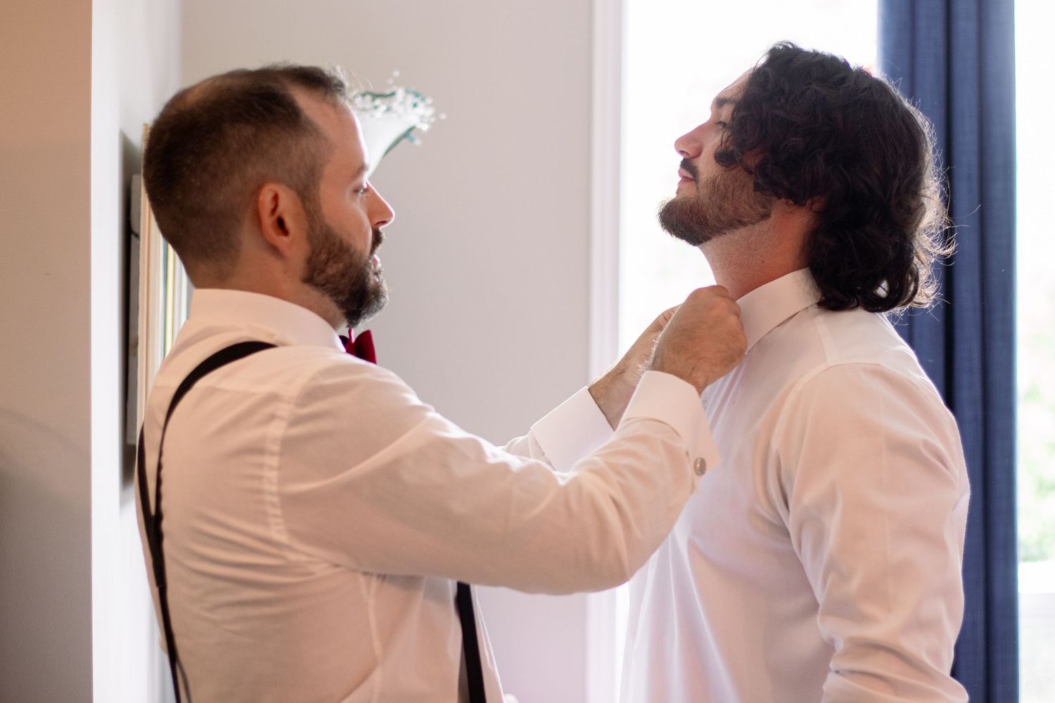 best man helping groomsmen in a special moment at kitchener–Waterloo Cambridge Region