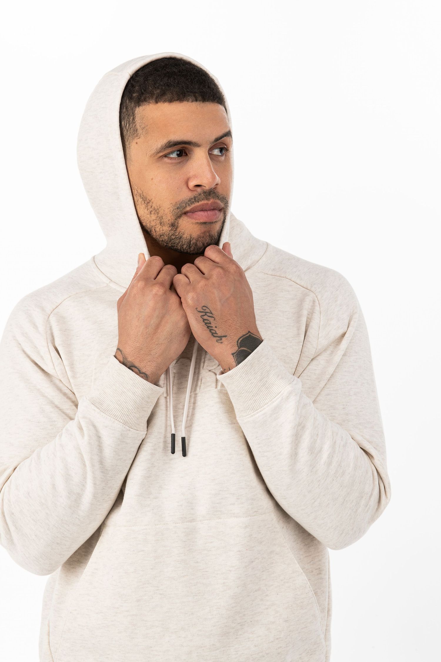 Four sequential photos show someone in a white hoodie making thoughtful expressions while resting their chin on their hand.