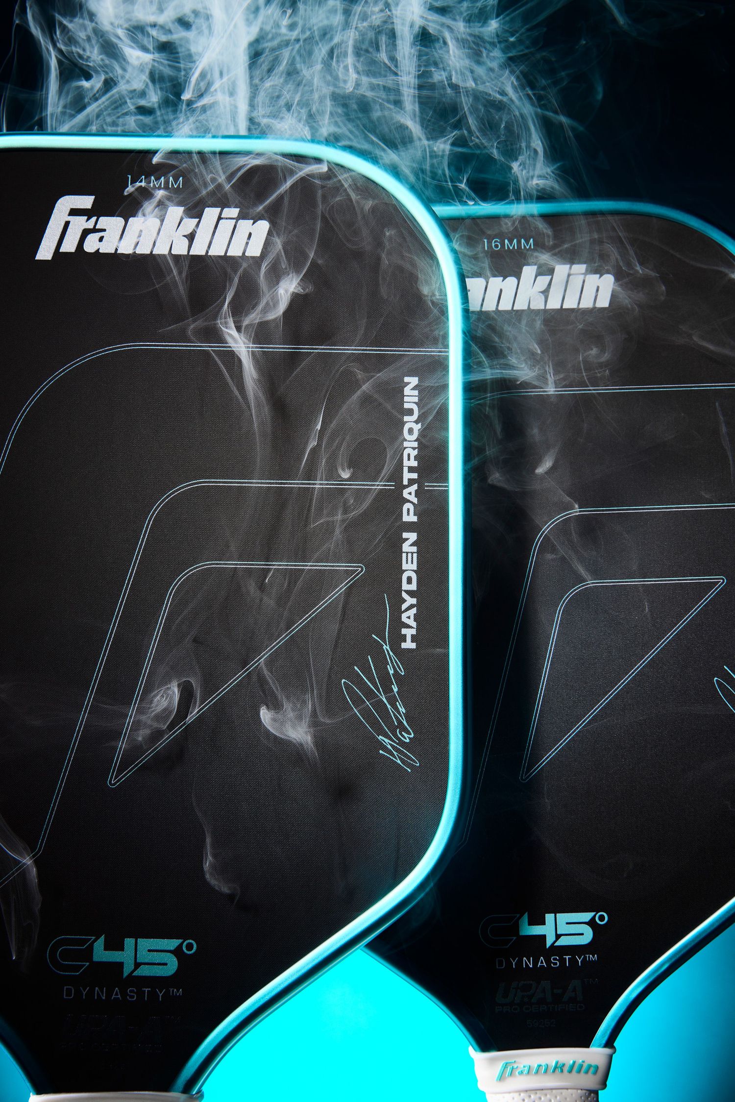 Franklin sports equipment packaging design features sleek black and neon blue gradient with smoke effect and geometric shapes.