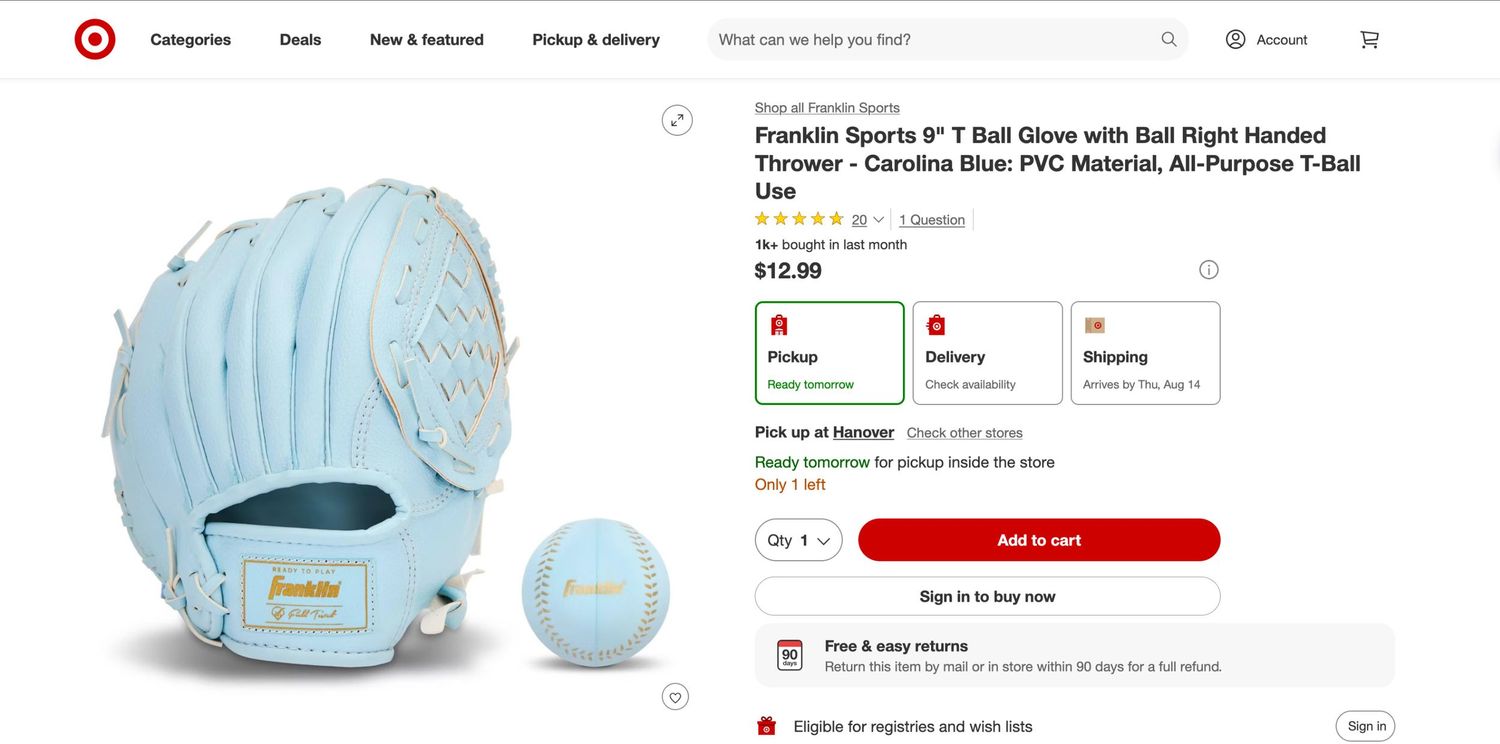 Light blue baby hat with embroidered design and matching mittens displayed on Target product page.