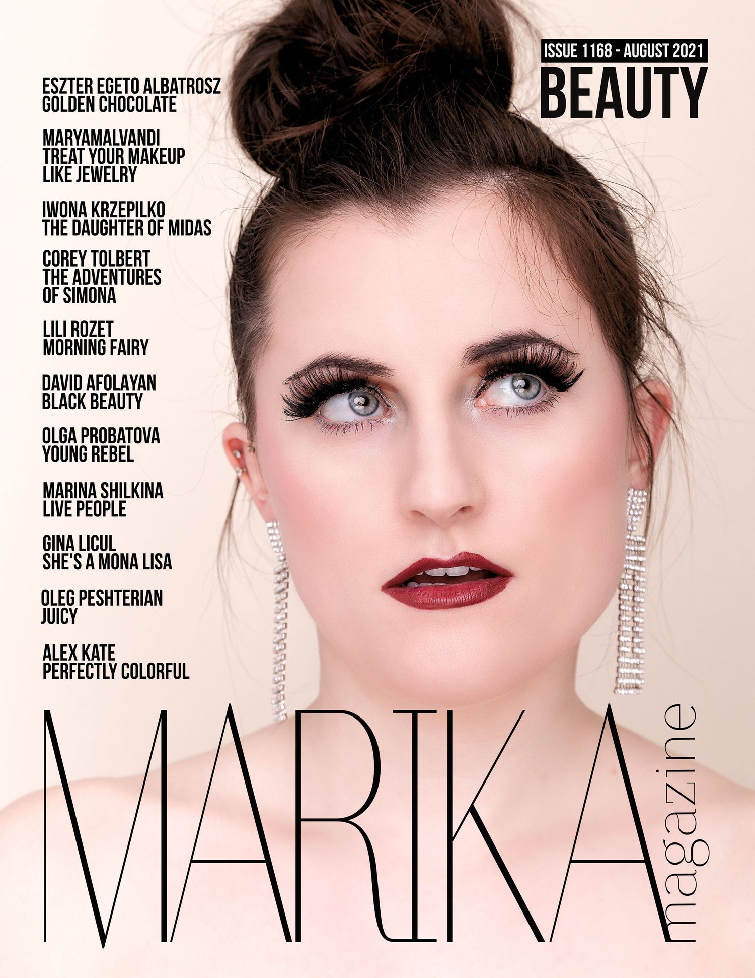 Beauty magazine cover featuring dramatic makeup with dark red lipstick, winged eyeliner and sparkly dangling earrings.