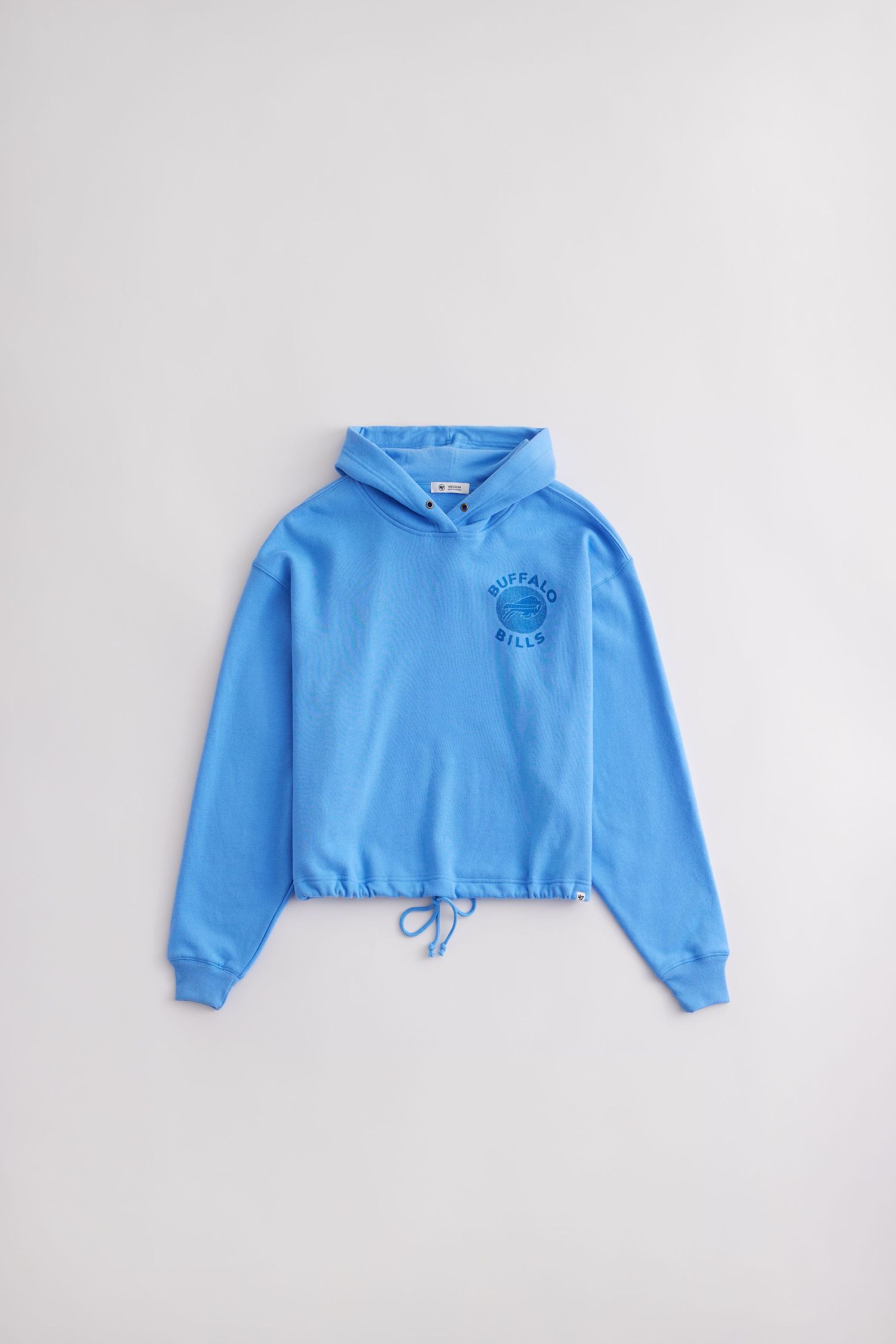 A bright blue cropped sweatshirt with a high collar shown from different angles against a white background.