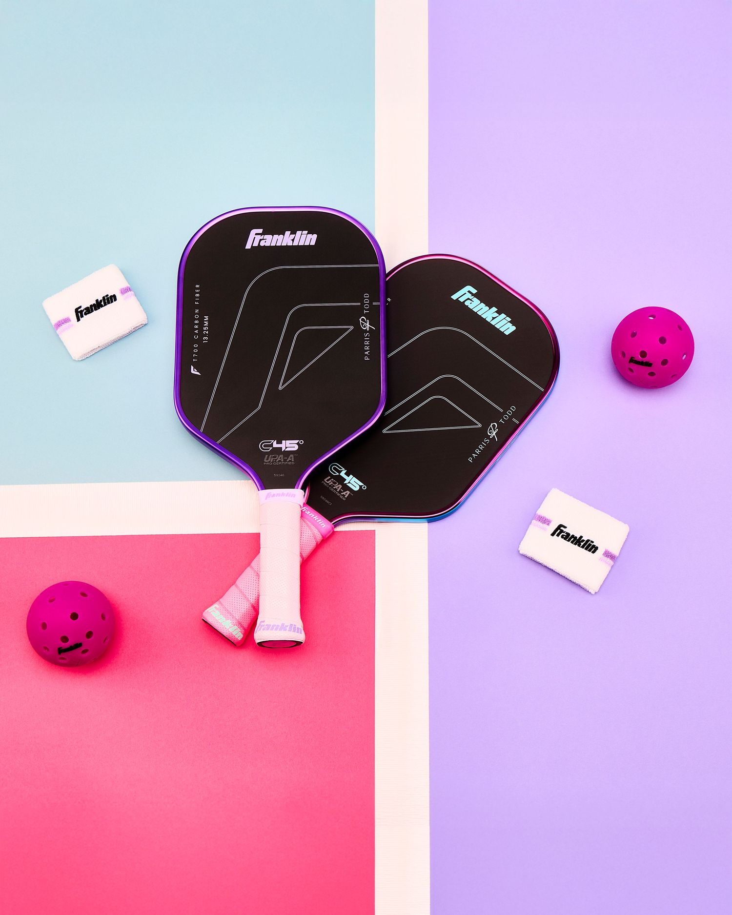 Parris Todd Franklin Sports pickleball paddles and pink balls on a colorful geometric background with blue, pink and purple sections.