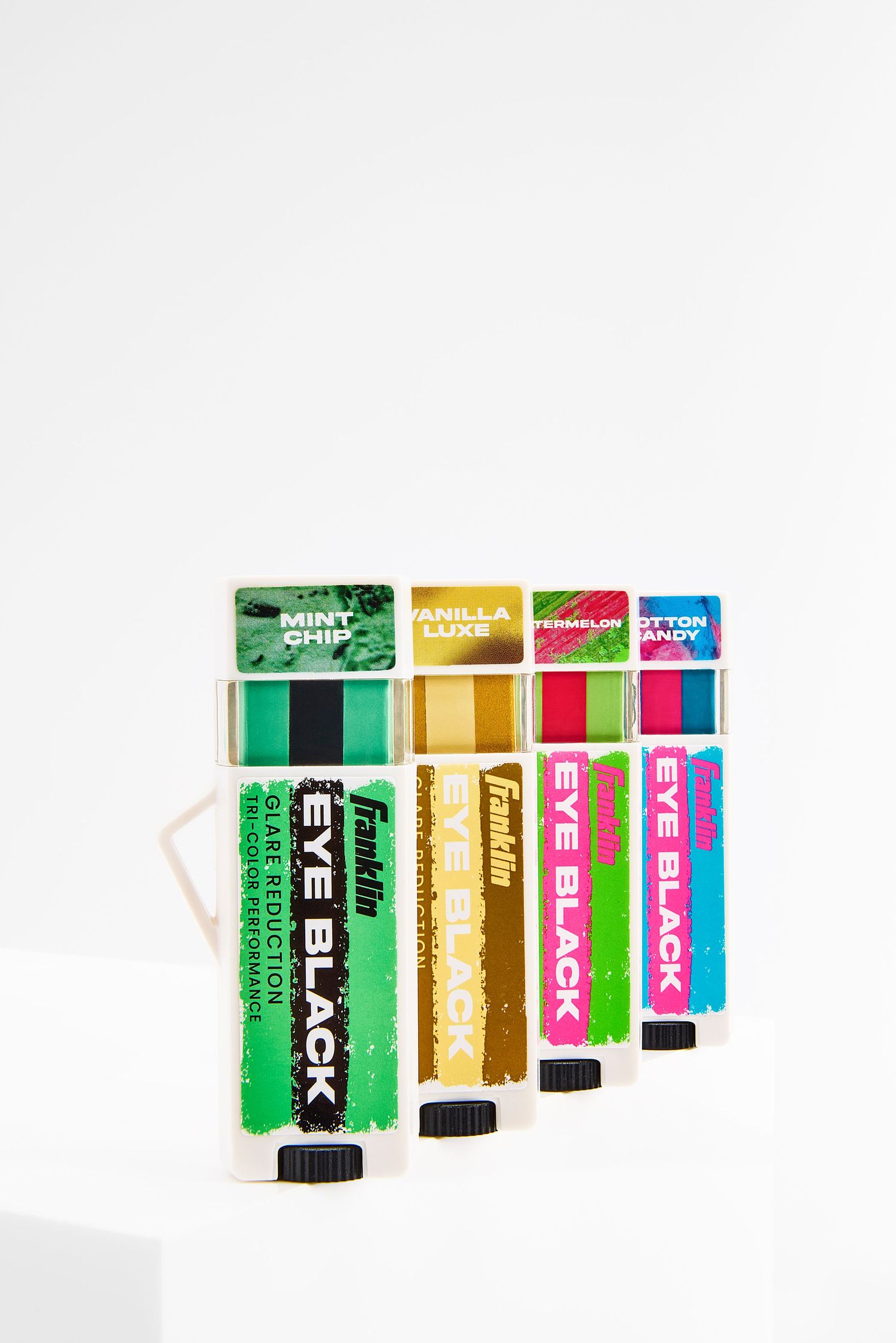 A collection of colorful eyeblacks arranged in a row showing different film types and brands.