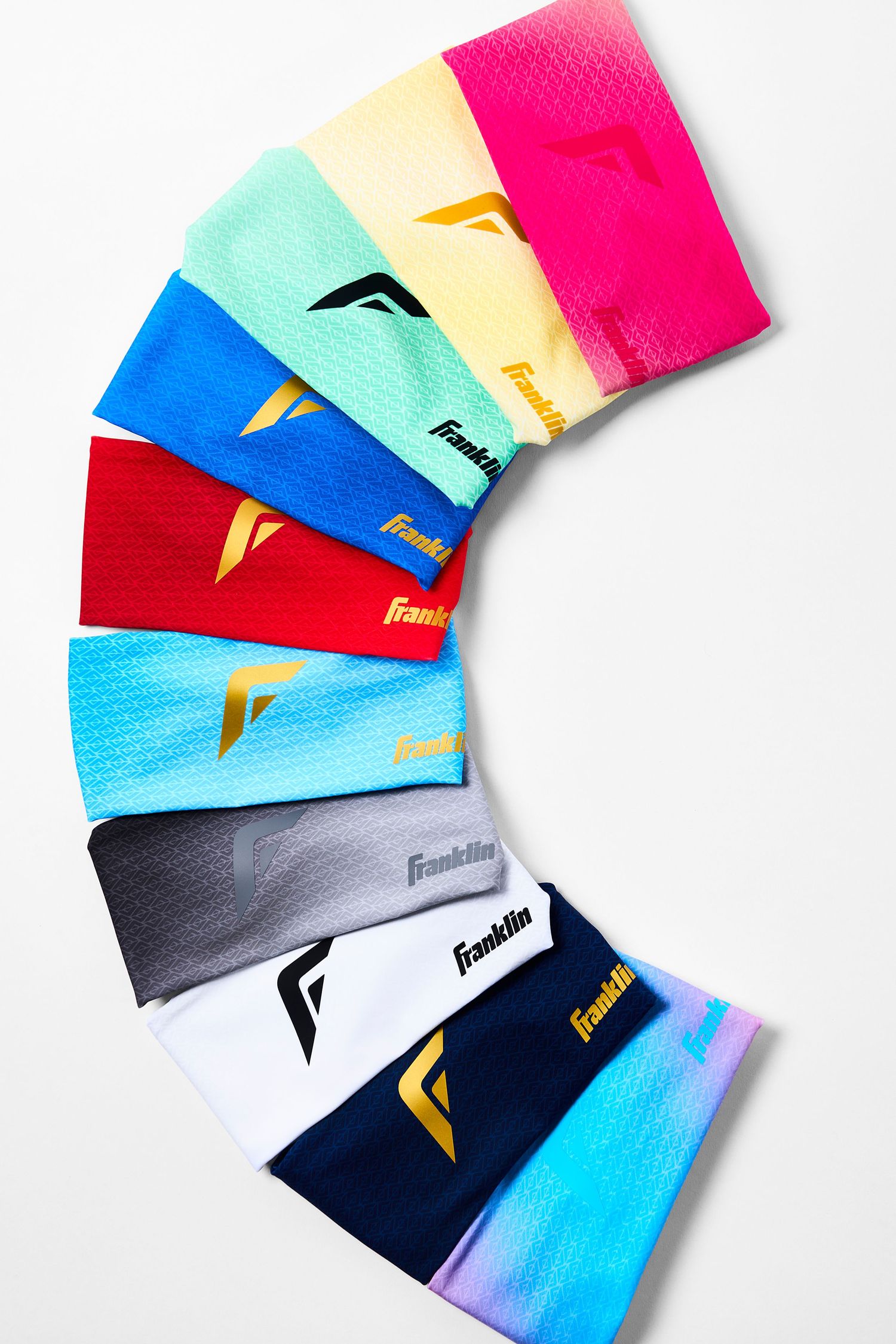Colorful collection of Franklin Sports headbands arranged in a fan pattern against white background.