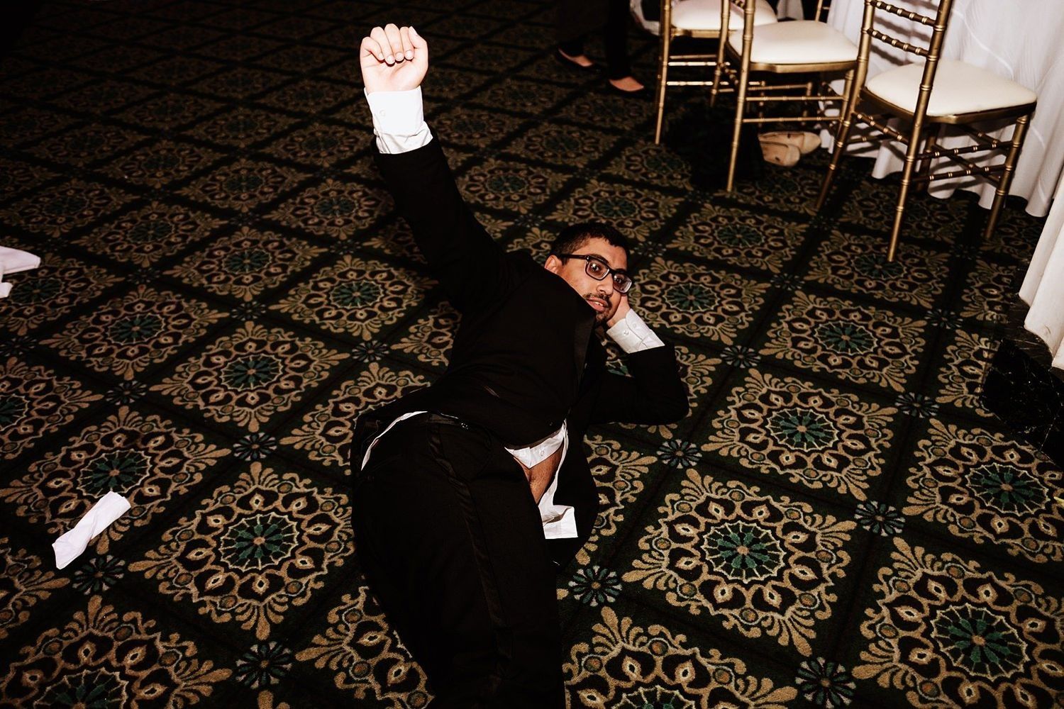Wild and fun wedding party moments: guests dancing with total abandon at The Ballroom at McKay