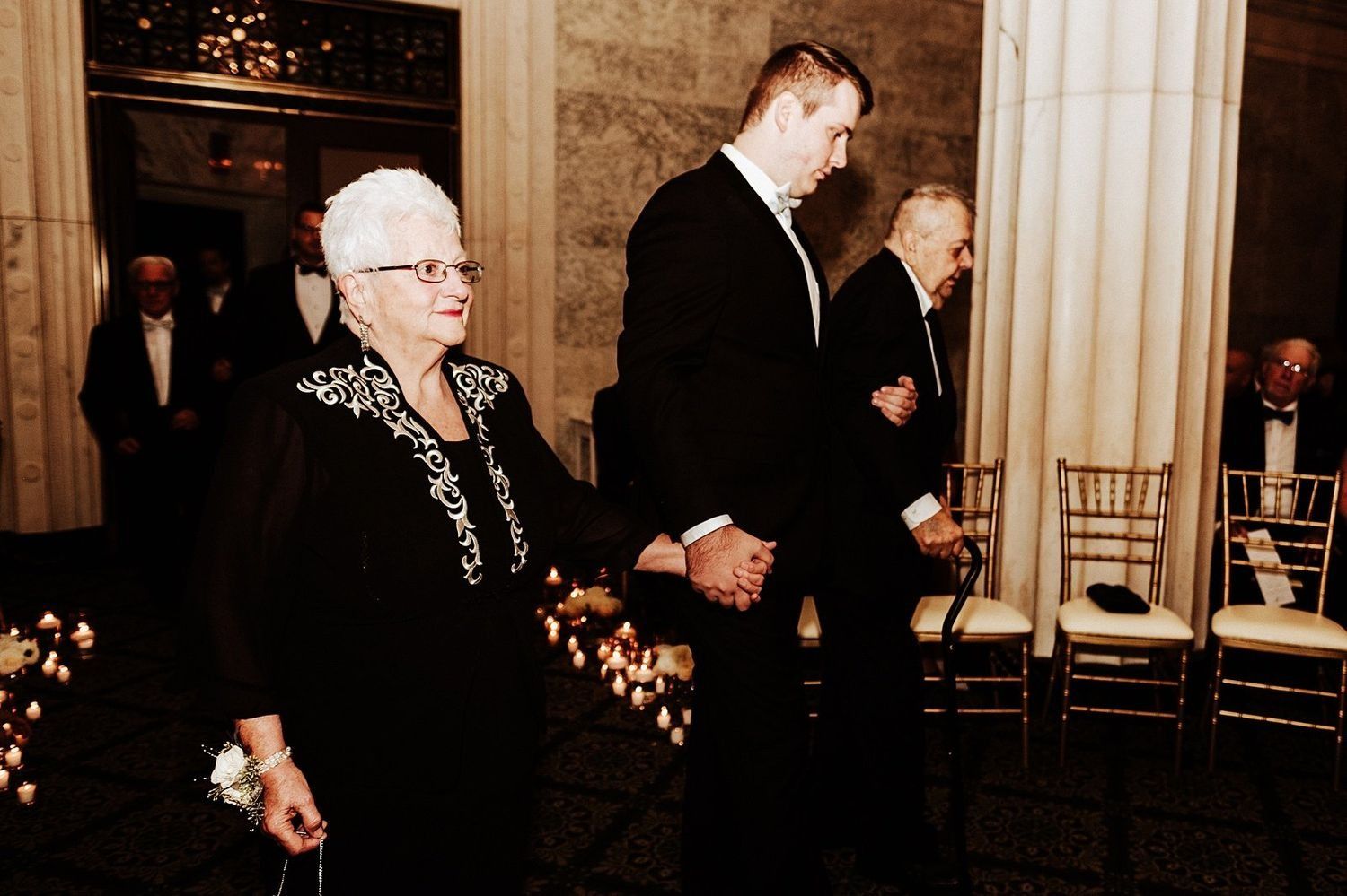 Wedding processional protocol: Grandparents walking down the aisle at McKay Ballroom