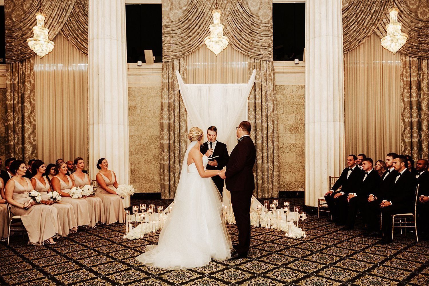 Wide angle view of The Ballroom at McKay during Shannon and Karel's wedding vows