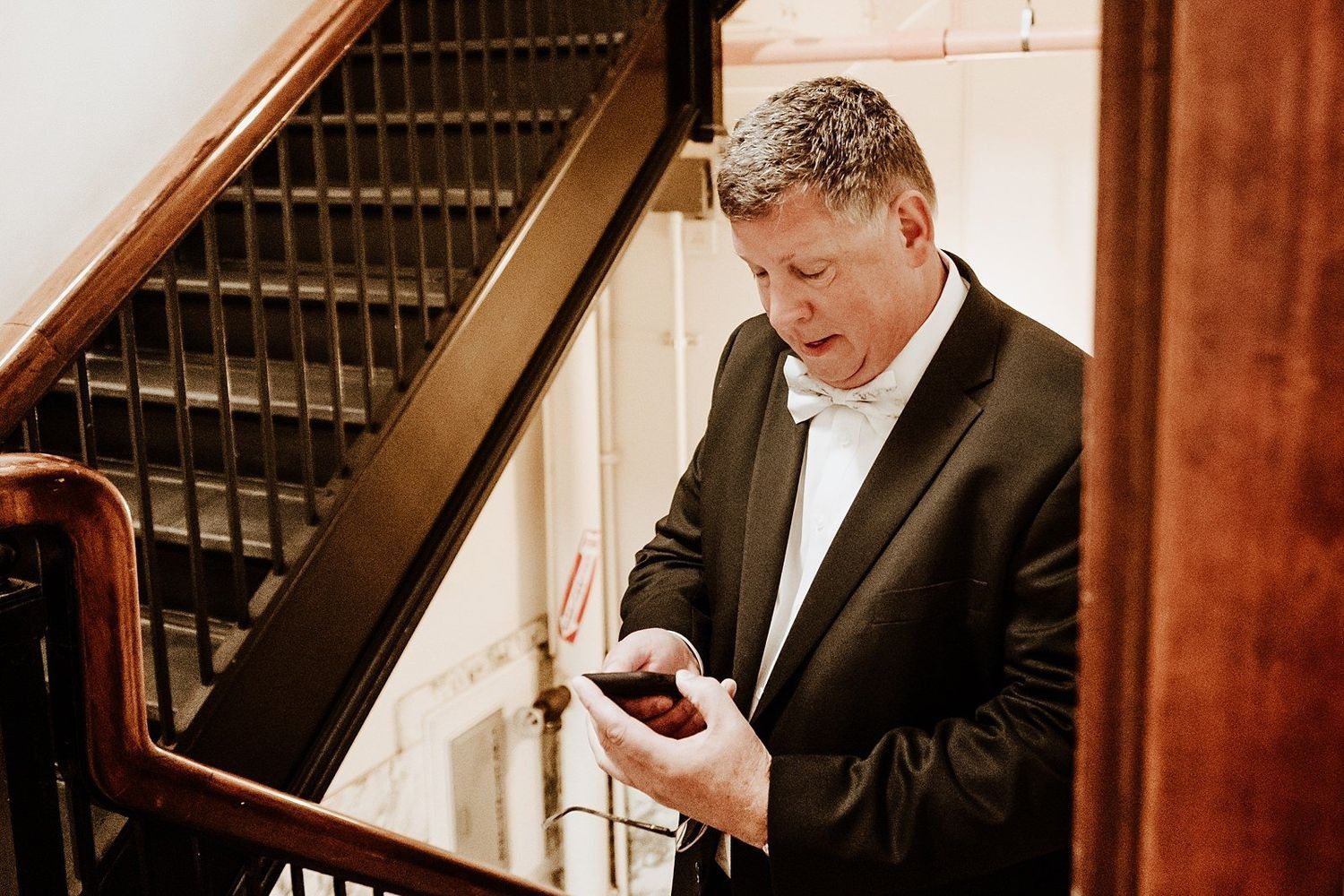 Daniel, the father of the bride, waiting anxiously for the first look in Grand Rapids