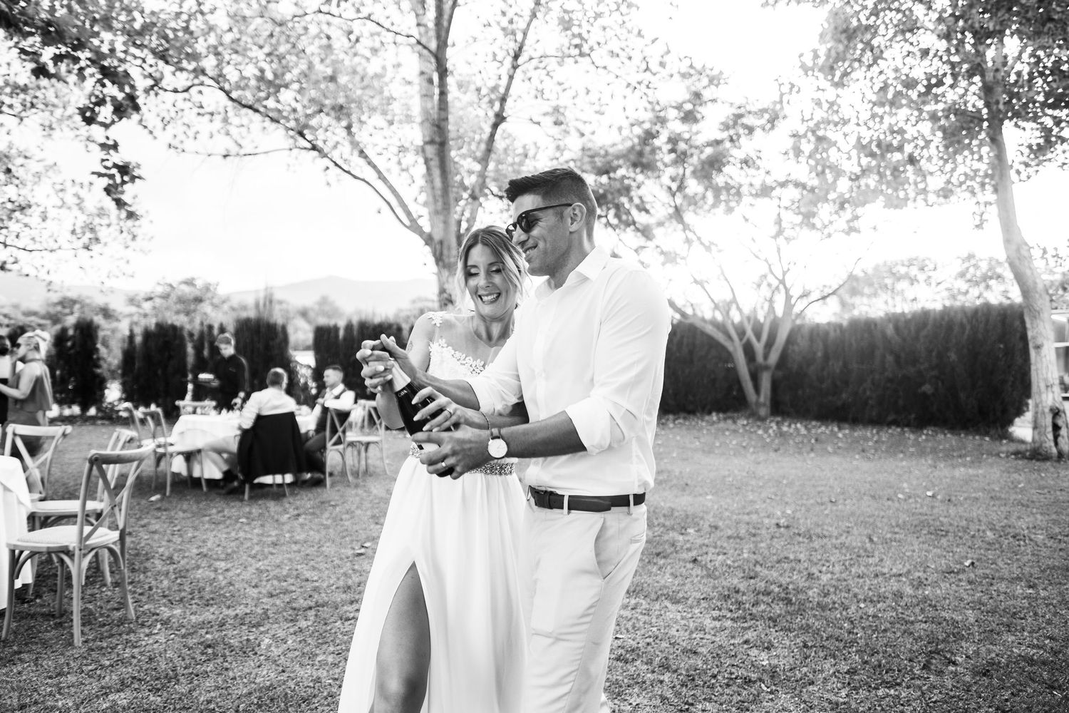British guests enjoying a wild wedding party in Spain, documentary style