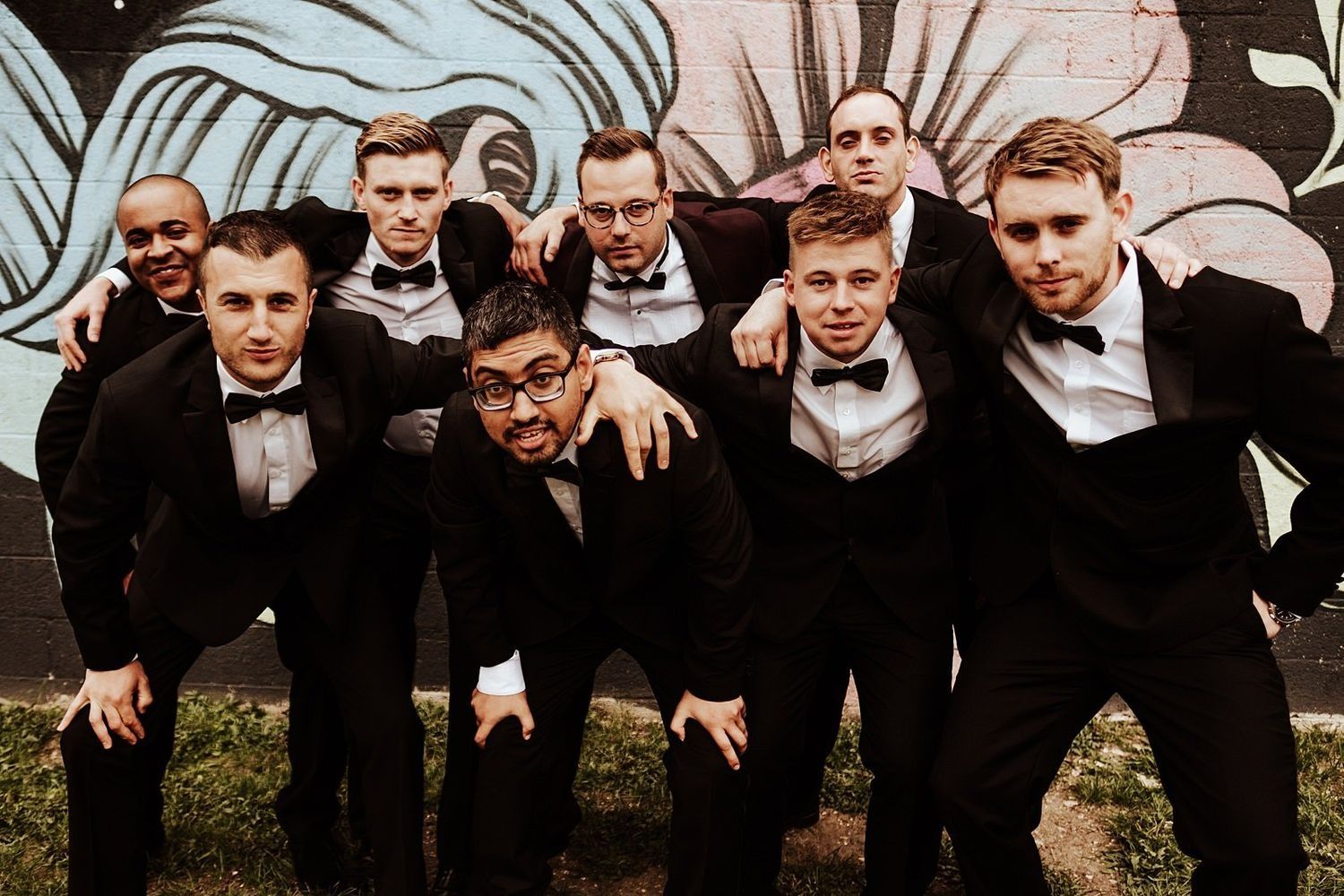 Fun and candid wedding guests enjoying the lively party with the newlyweds in Michigan