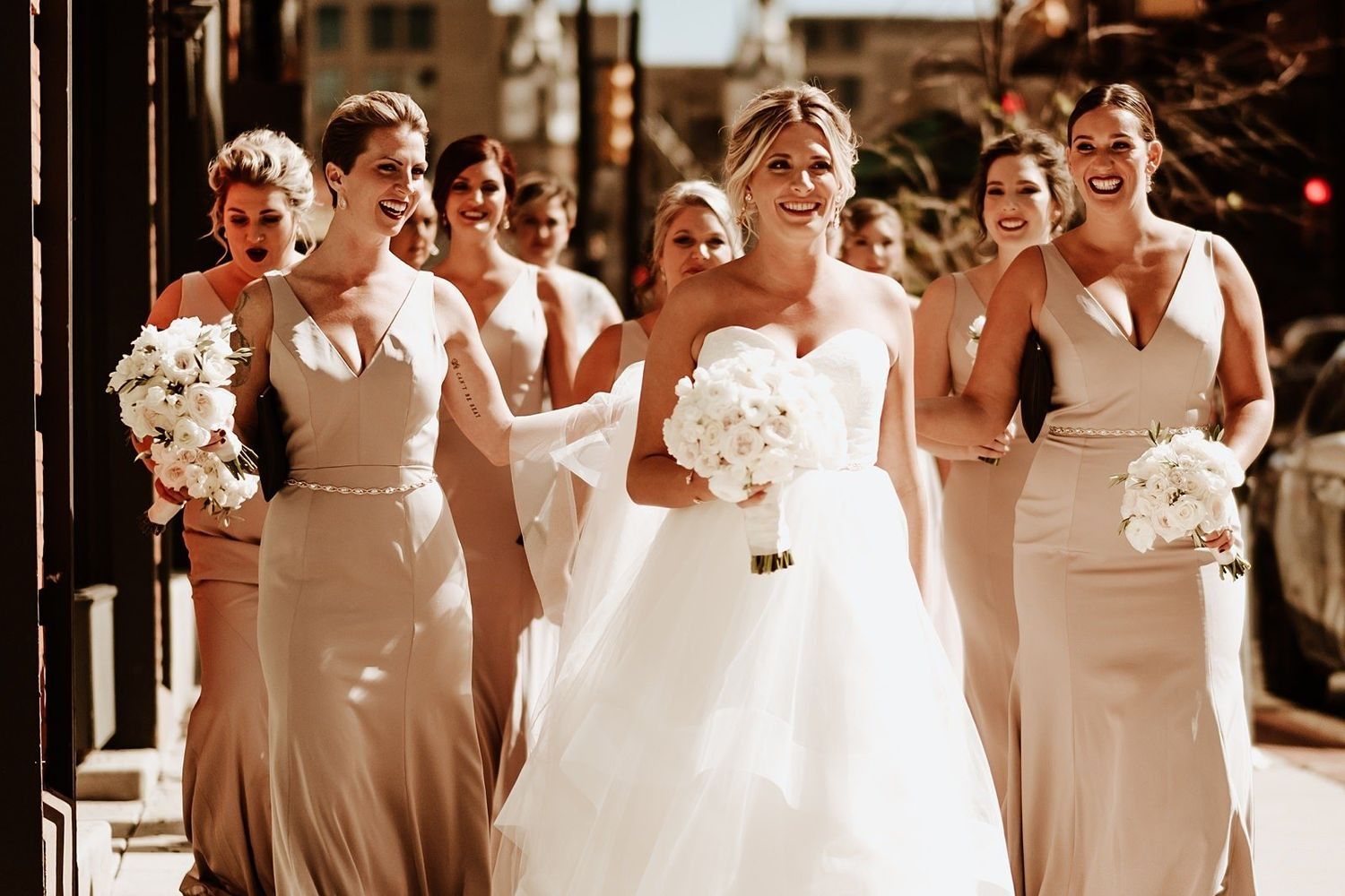 Group hug with the bridesmaids in downtown Grand Rapids