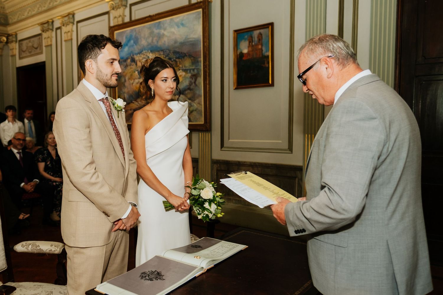 Registrar Adrian Traverso reading marriage vows at Gibraltar Registry Office with  - Civil wedding ceremony