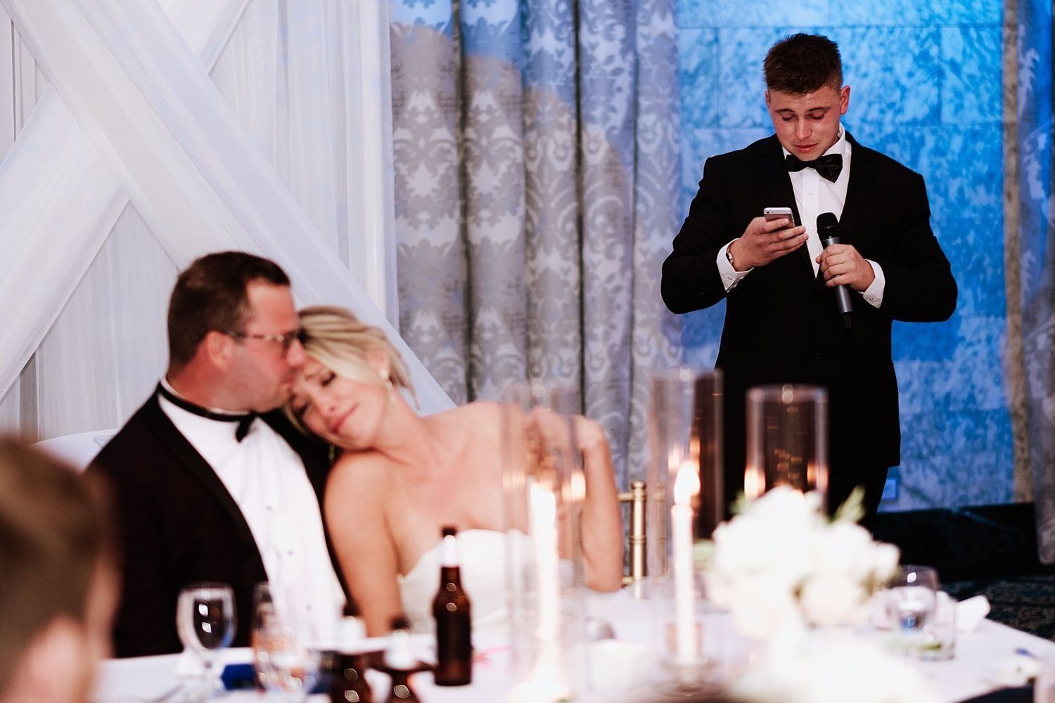 Shannon's brother giving a heartfelt and emotional speech during the wedding reception in Grand Rapids
