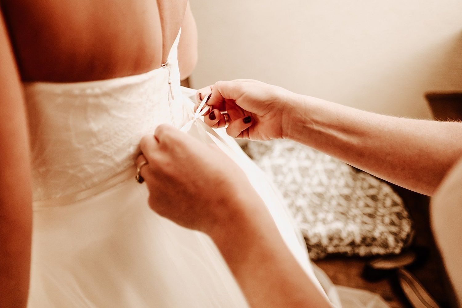 Detailed shot of Shannon’s bridal dress and lace textures