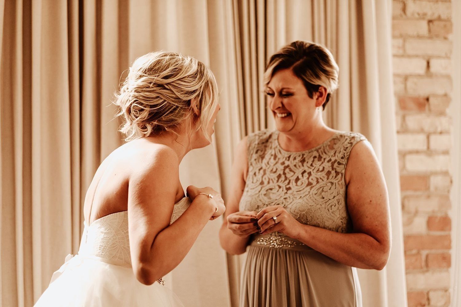 Shannon sharing a quiet moment before the wedding bustle starts