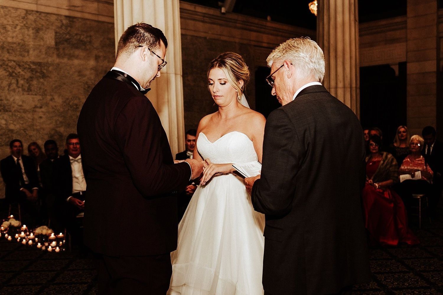 Shannon and Karel exchanging wedding rings at The Ballroom at McKay altar