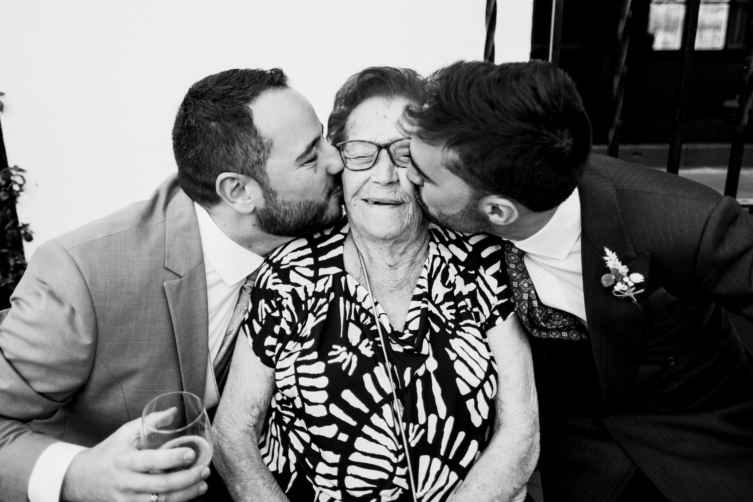 A series of black and white romantic photos showing intimate moments between a couple.