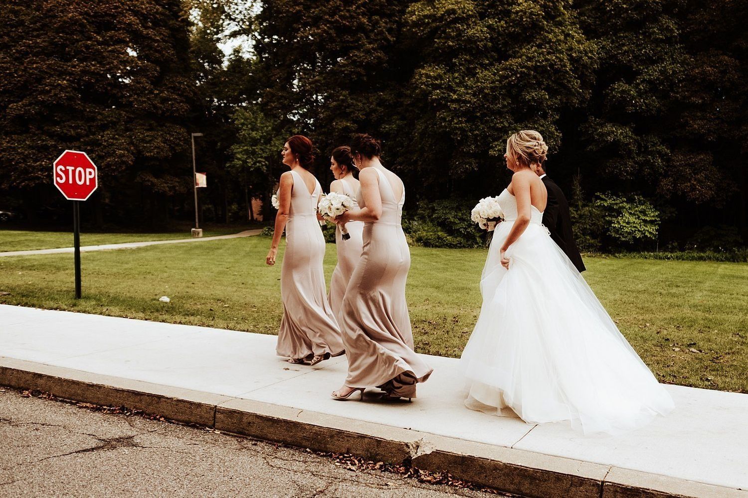 Bride Shannon walking through downtown Grand Rapids for her urban wedding session