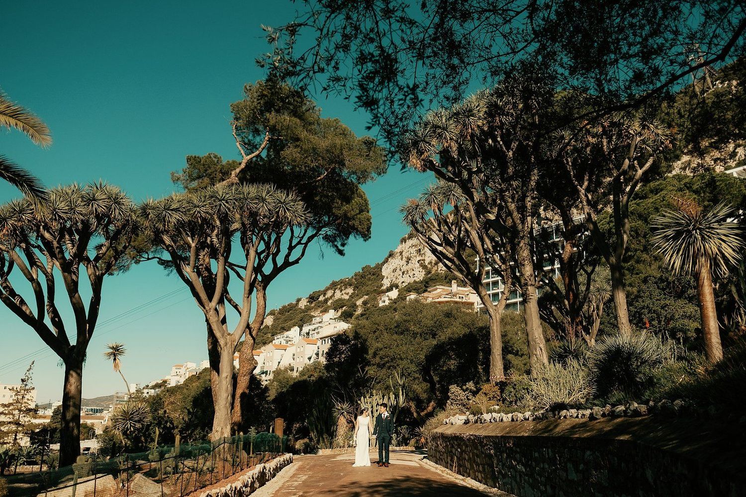 Panoramic wedding photo couple with The Rock of Gibraltar in background iconic view