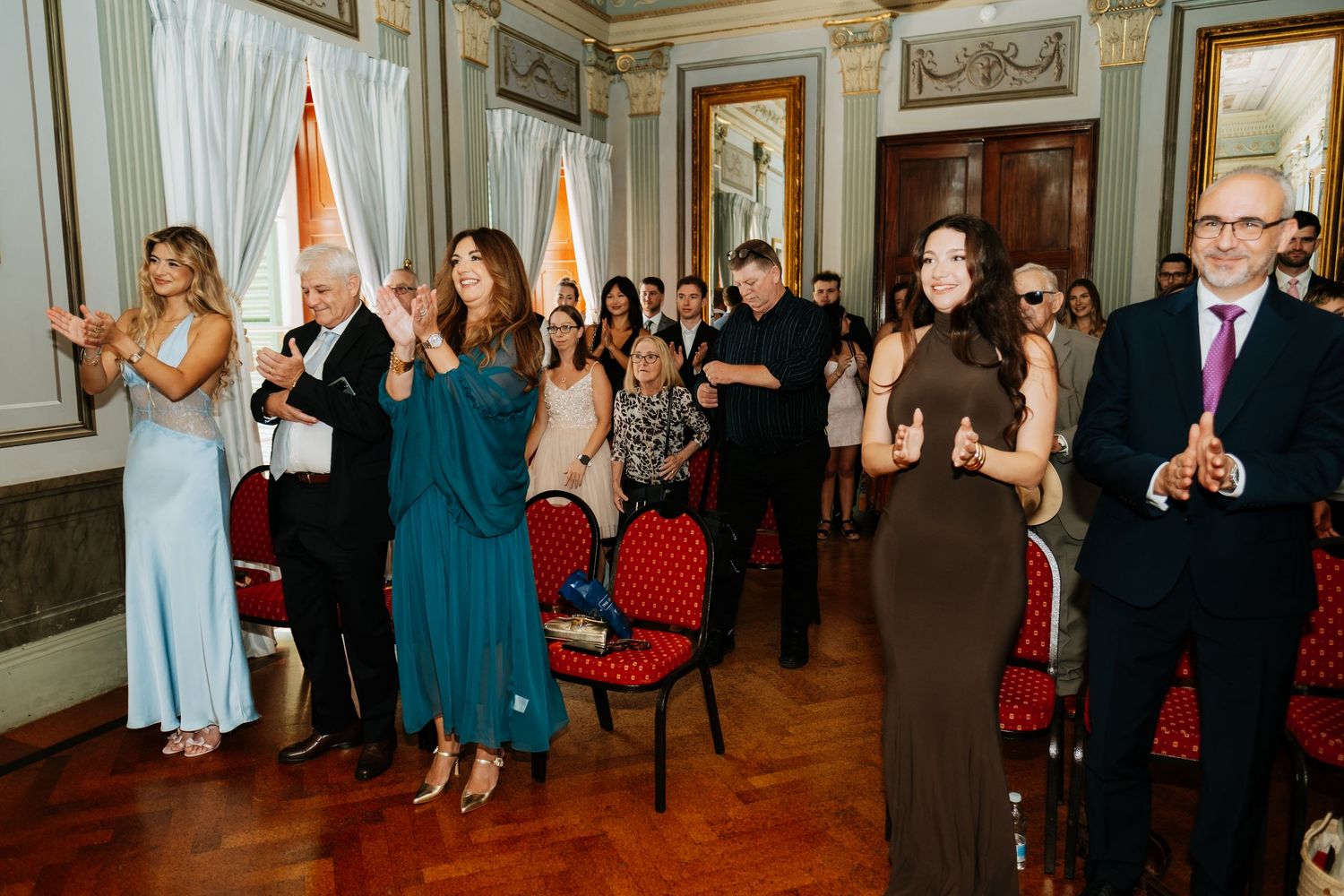 Newlyweds and guests celebrating inside the Mayor's Parlour at Gibraltar City Hall
