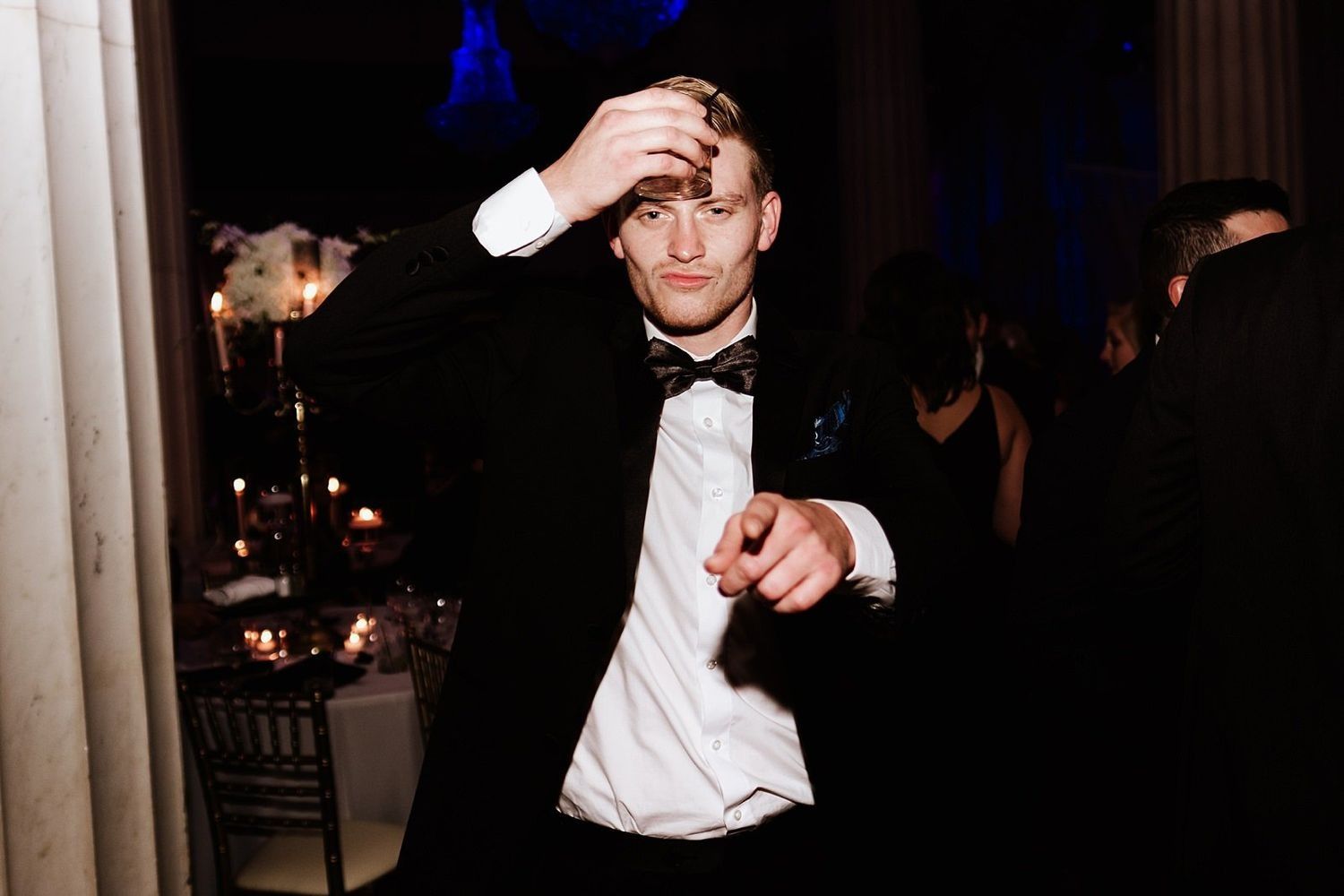 Joyful wedding guest dancing and celebrating on the dance floor in Michigan