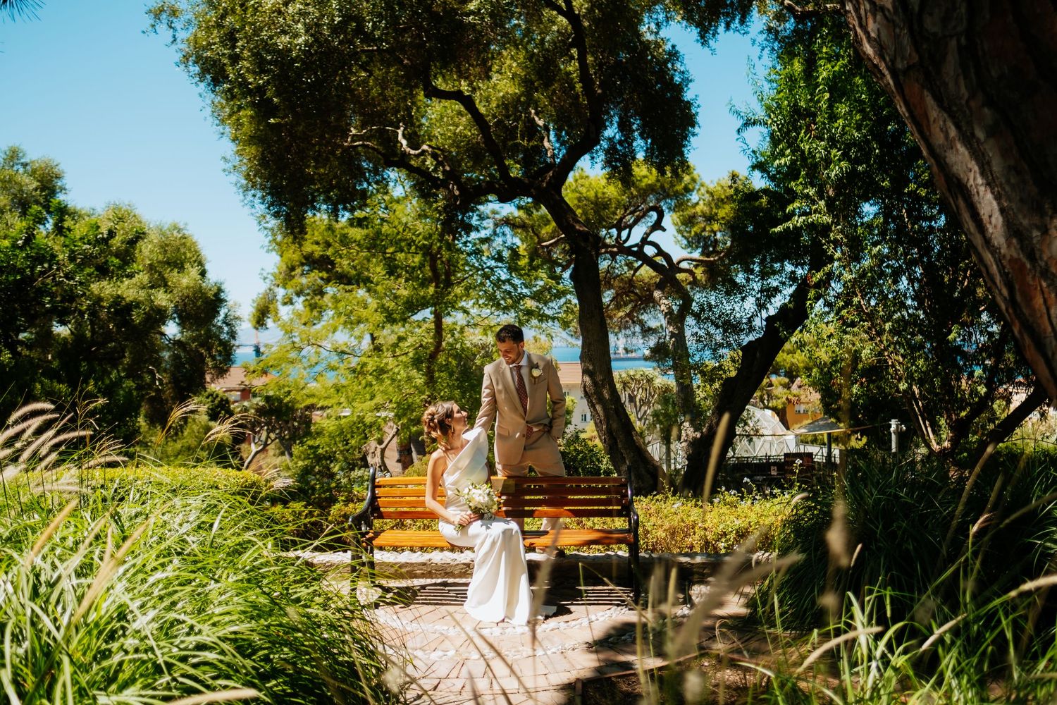 Bride and groom holding hands during civil ceremony at City Hall Gibraltar - Intimate elopement details