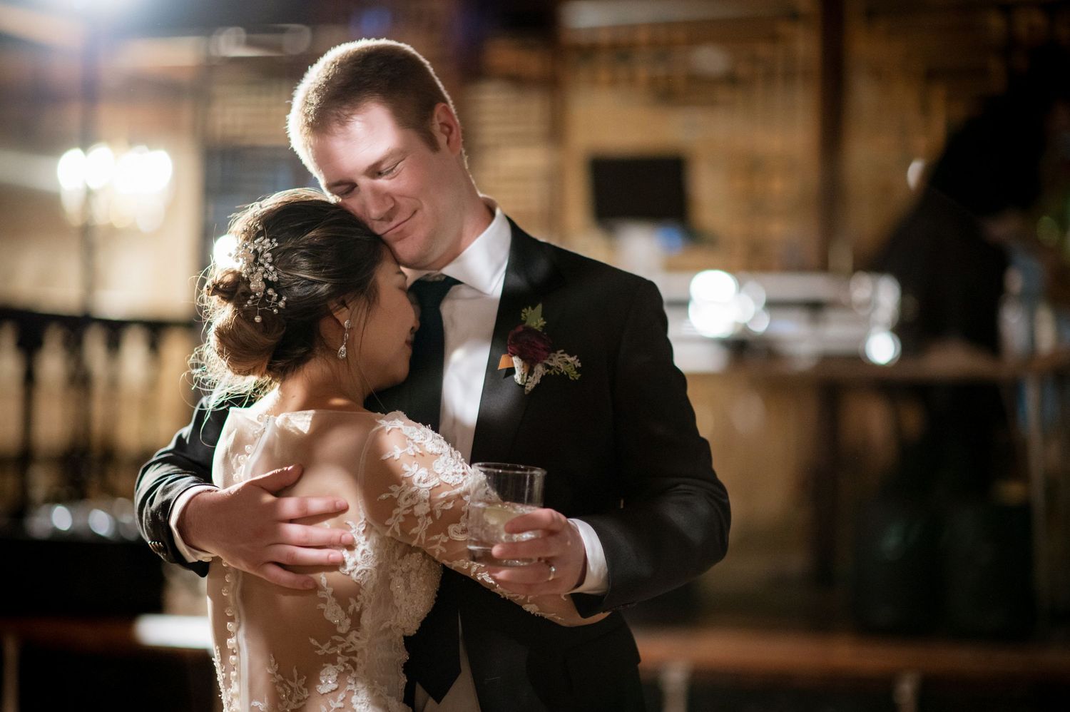 A four-panel progression shows a couple in formal attire dancing closely together at an elegant venue.